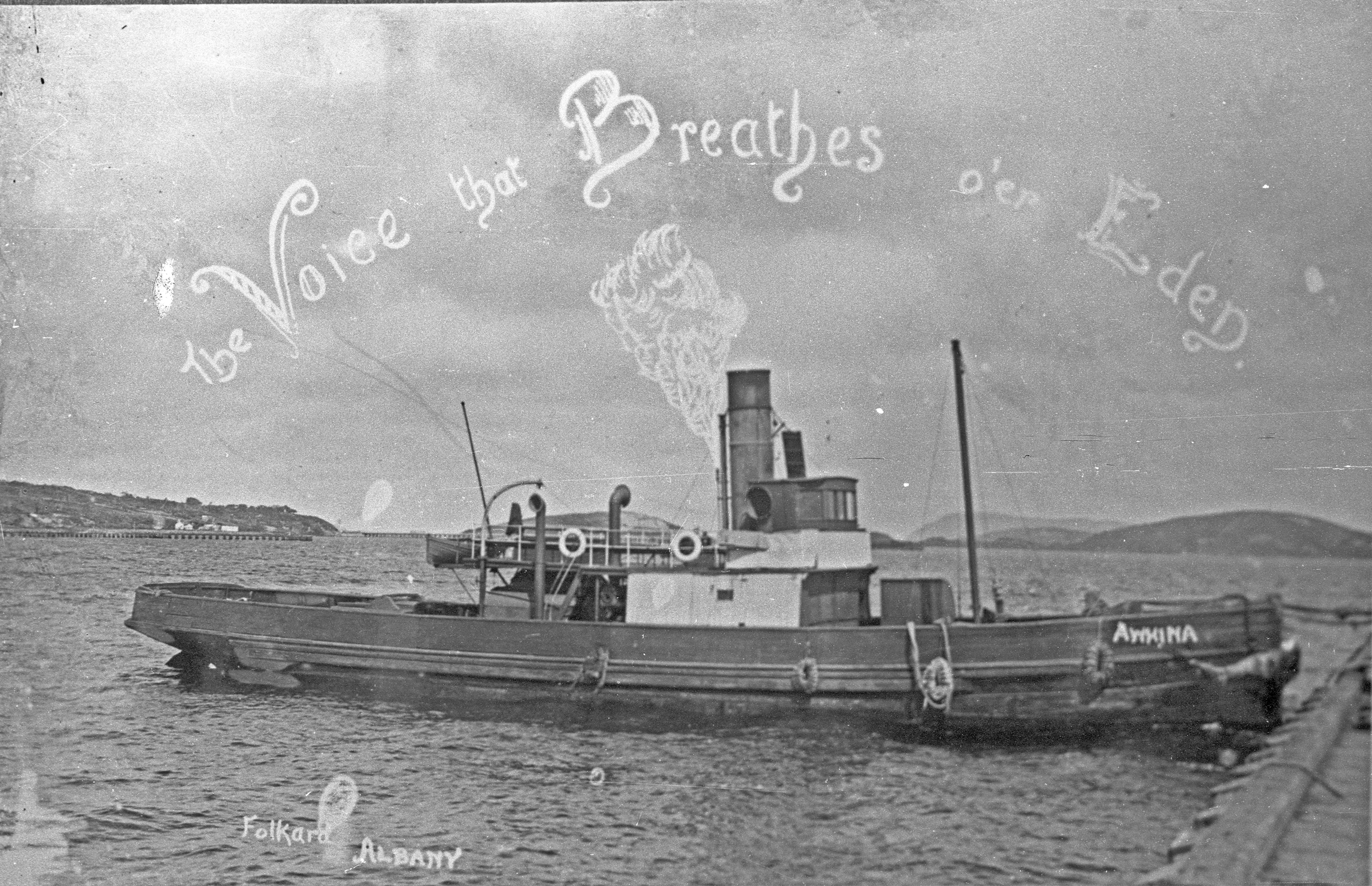 Black and white image of a tug boat