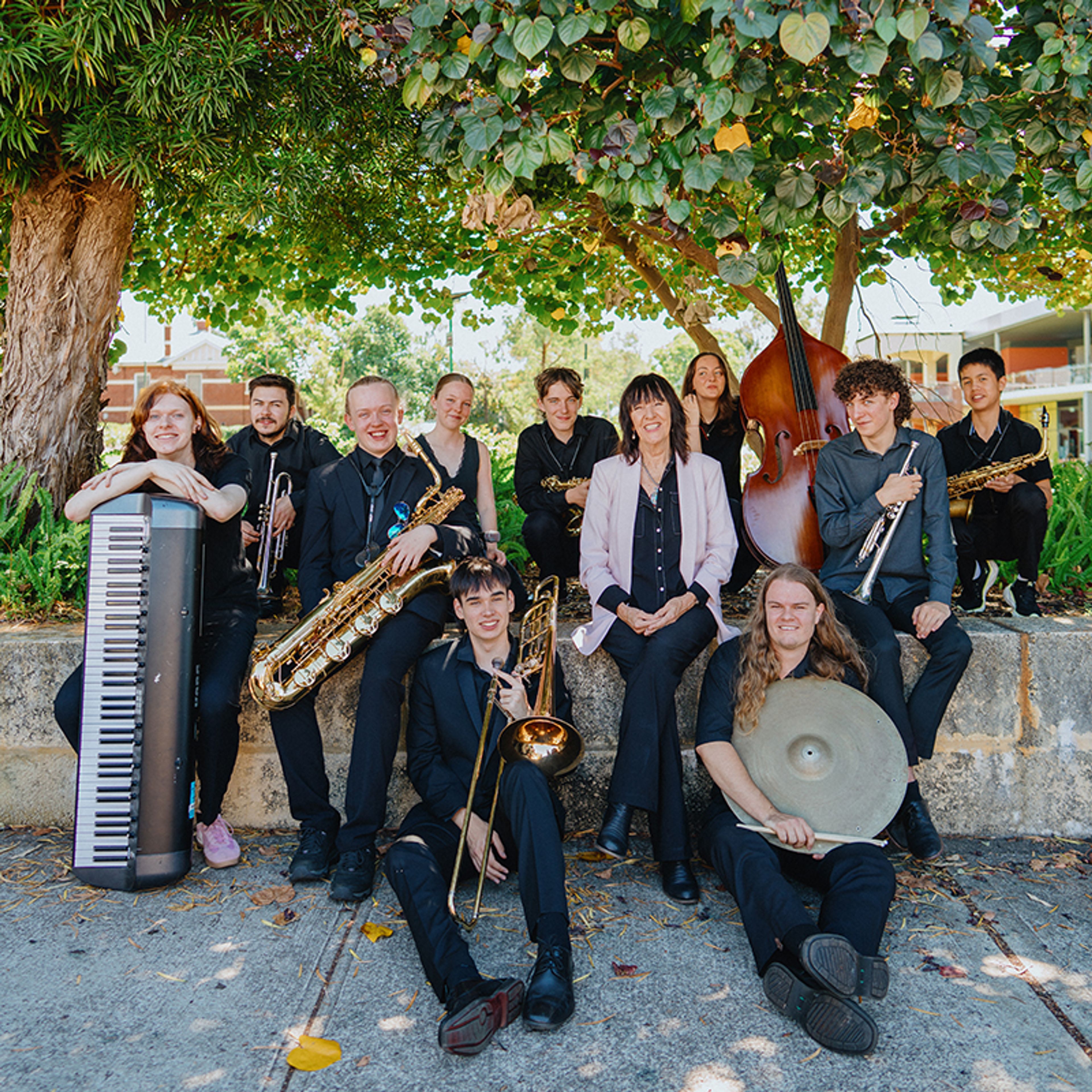 Staged image of the West Australian Youth Jazz Orchestra with their instruments
