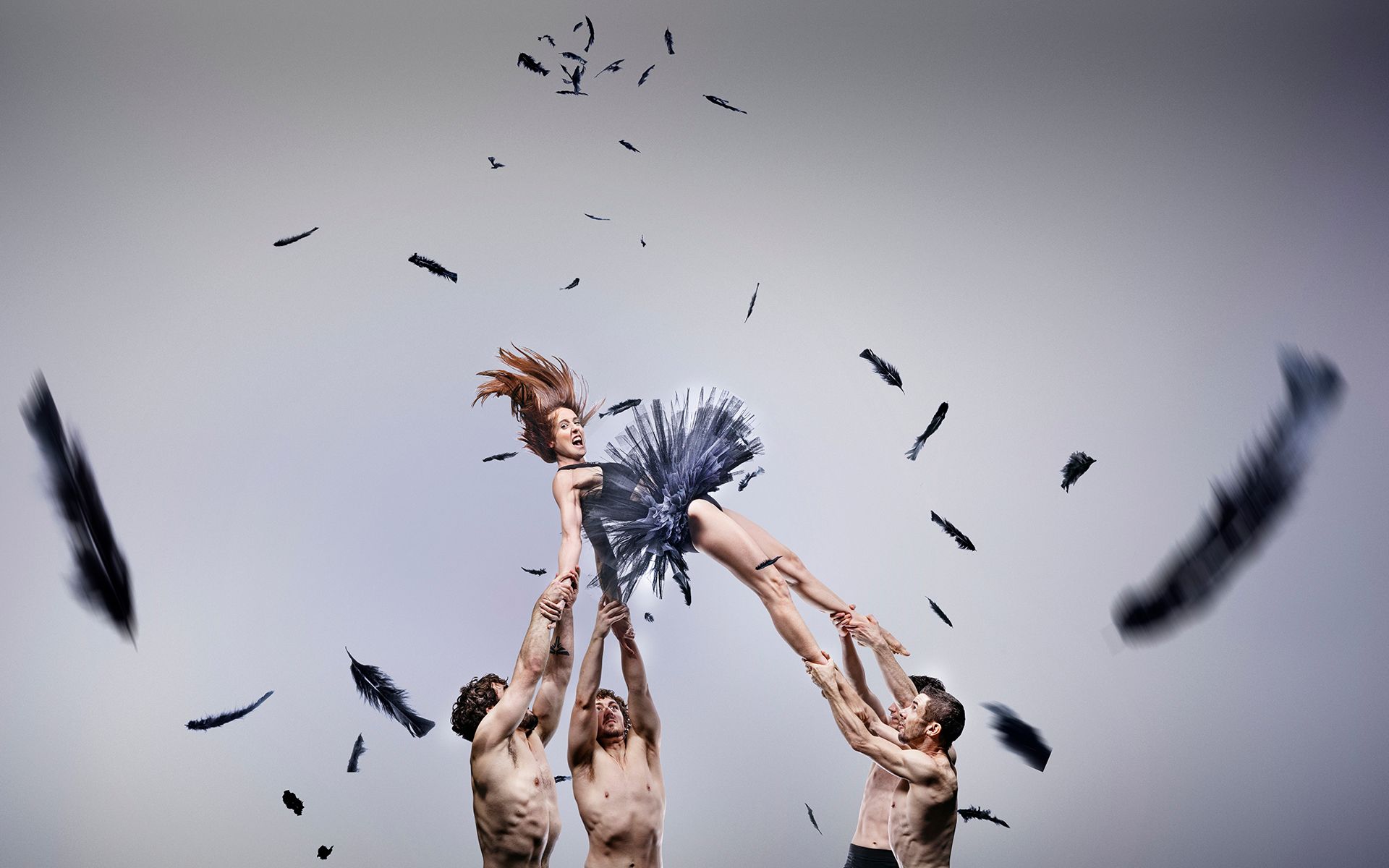 Ballet Dancer being tossed into the air