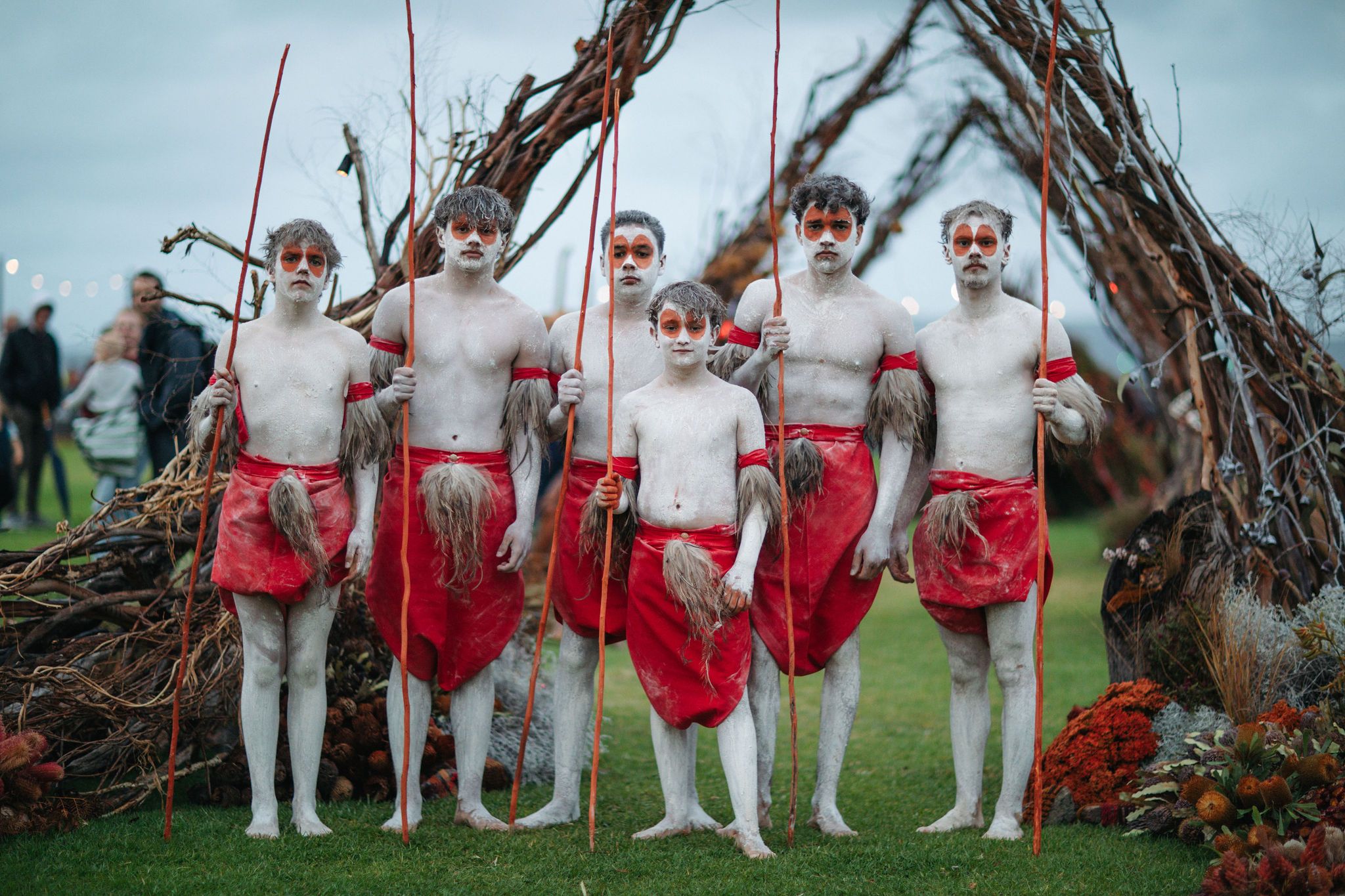 Menang Noongar dance group pose in traditional dress