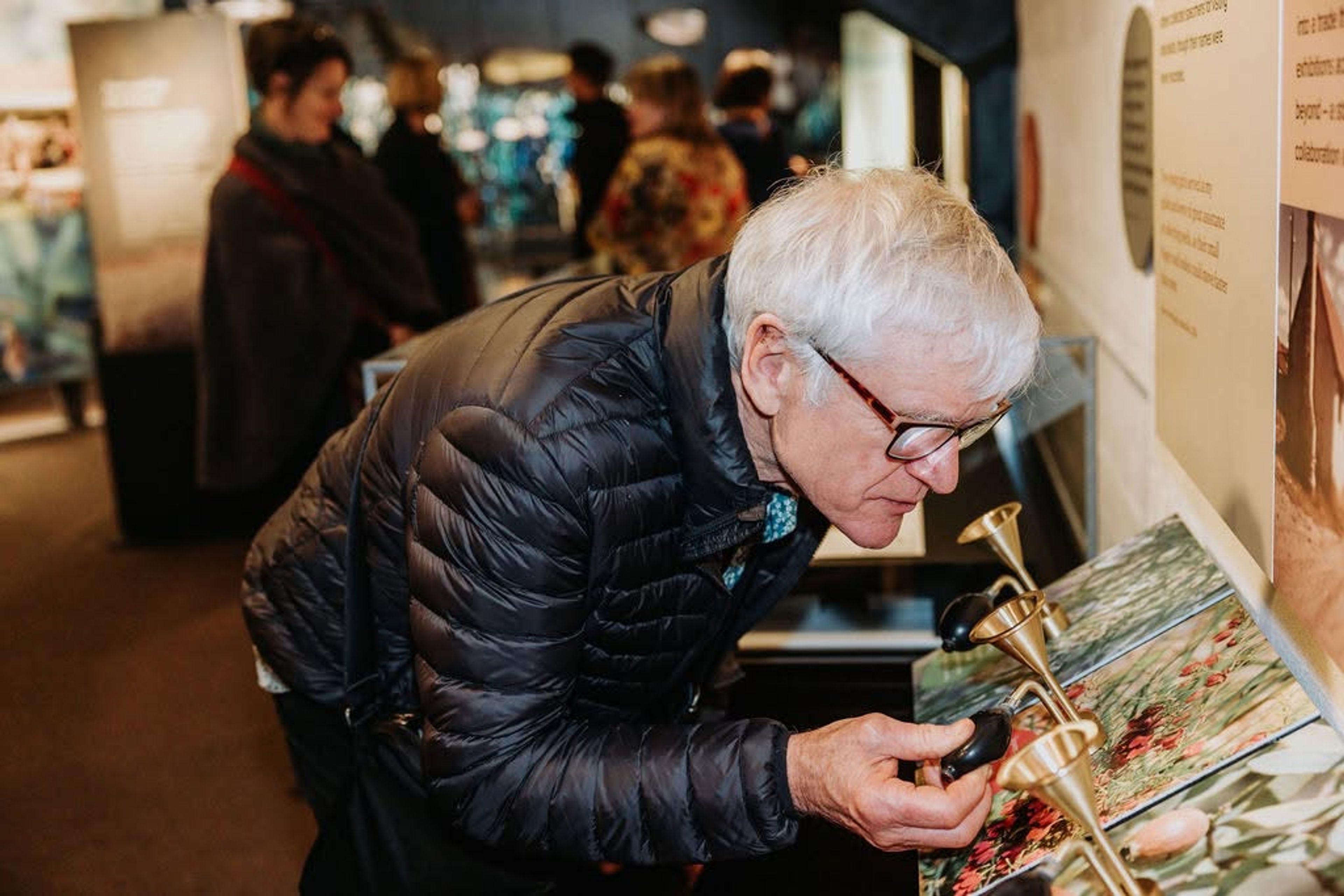Man engaging with exhibition