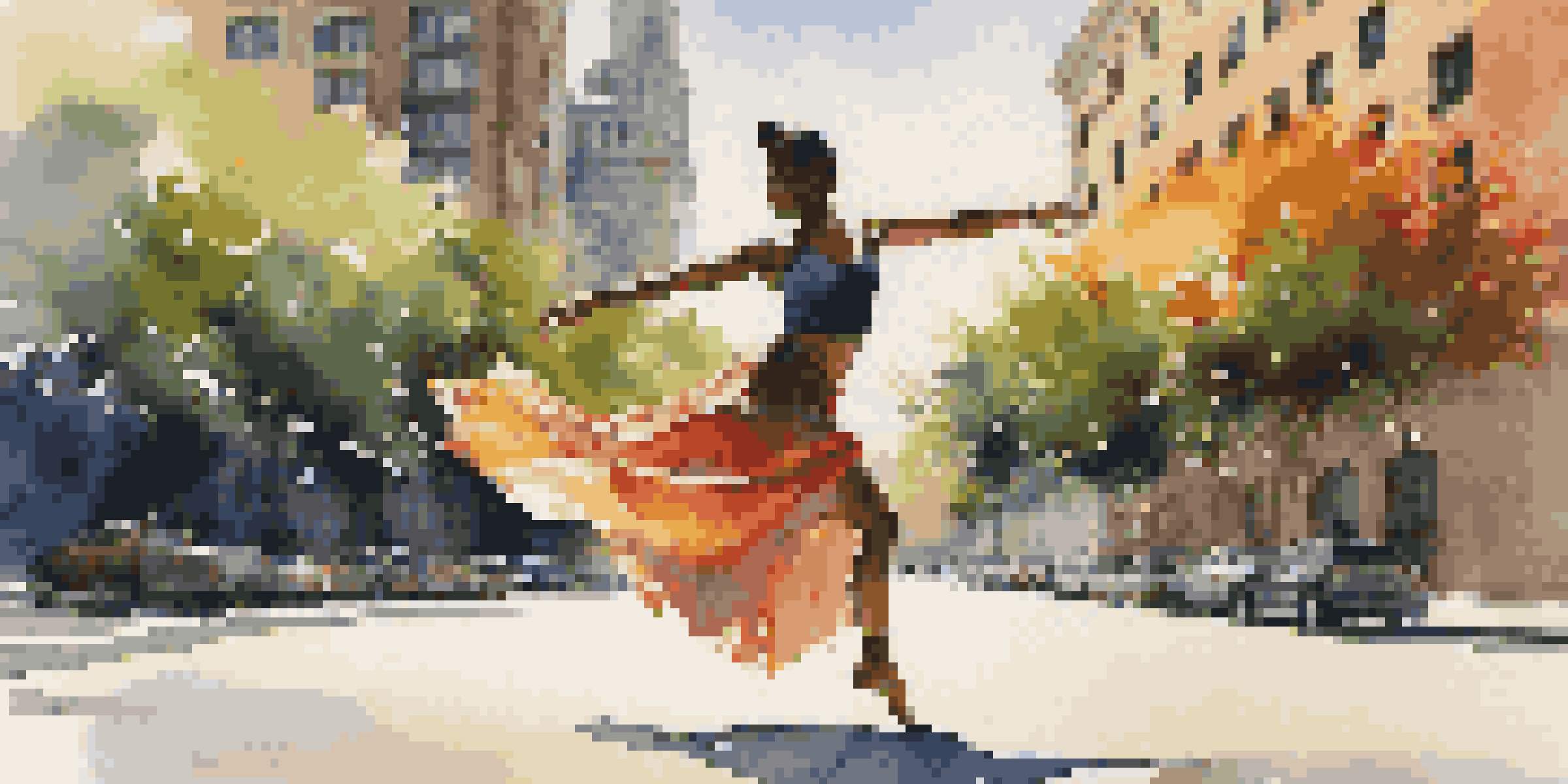 A contemporary dancer performing an intricate pose in a sunlit urban environment, wearing vibrant attire surrounded by modern buildings and greenery.