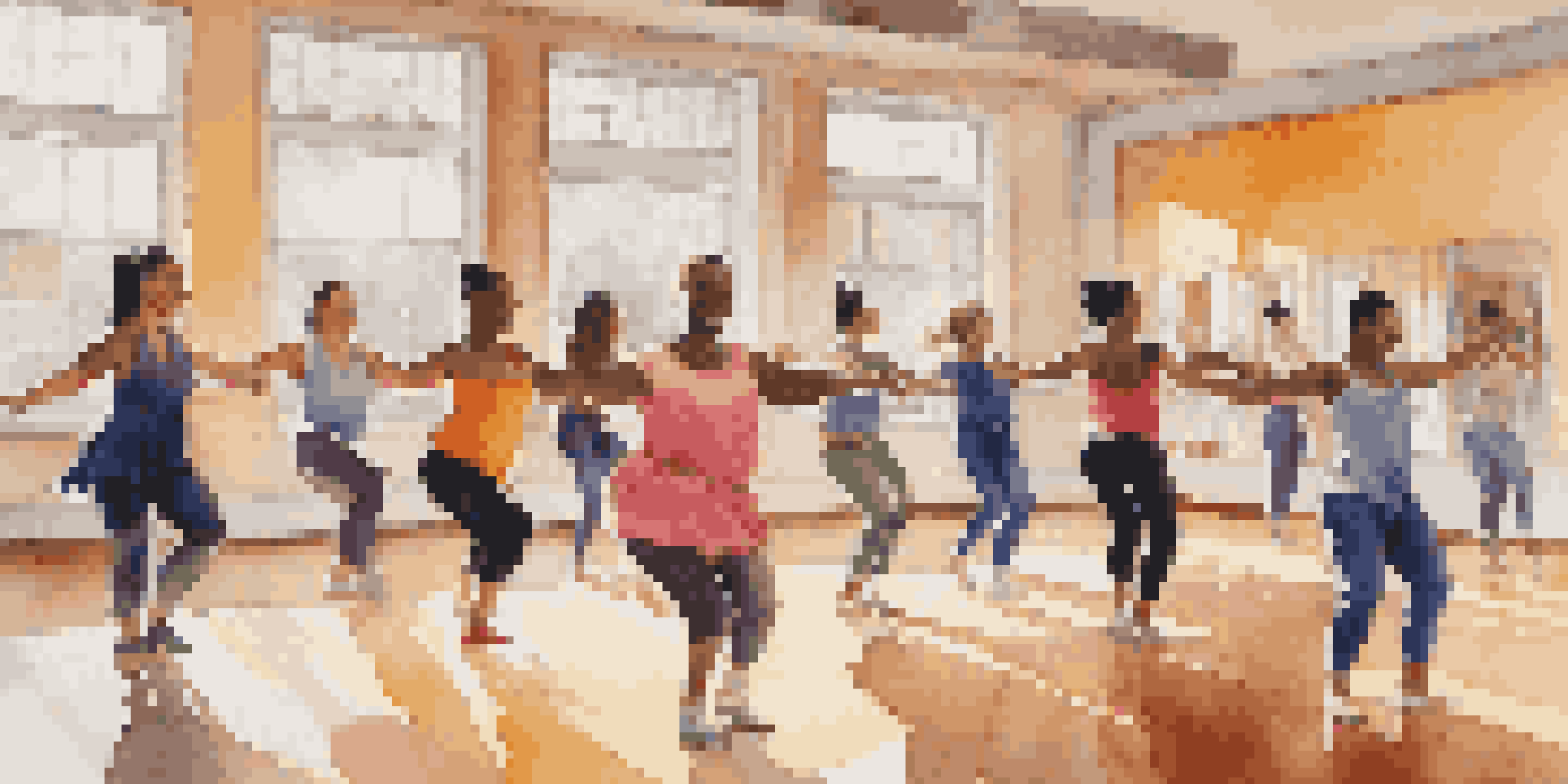 A dance class in a bright studio with a diverse group of dancers, including an instructor helping a dancer in a wheelchair, showcasing an inclusive environment.