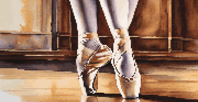 A close-up of a dancer's feet in ballet shoes on a wooden floor, with soft lighting accentuating the dancer's pose and a blurred theater stage in the background.