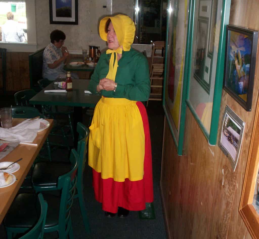 A woman dressed in Maggie Setzer's traditional attire.