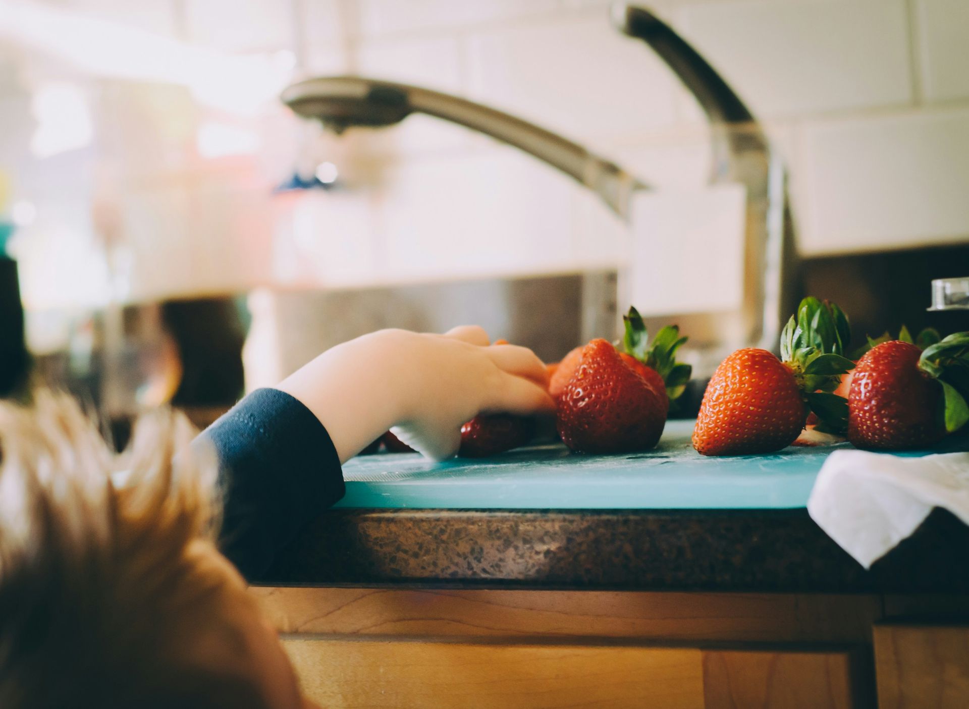 Child grabs fruit