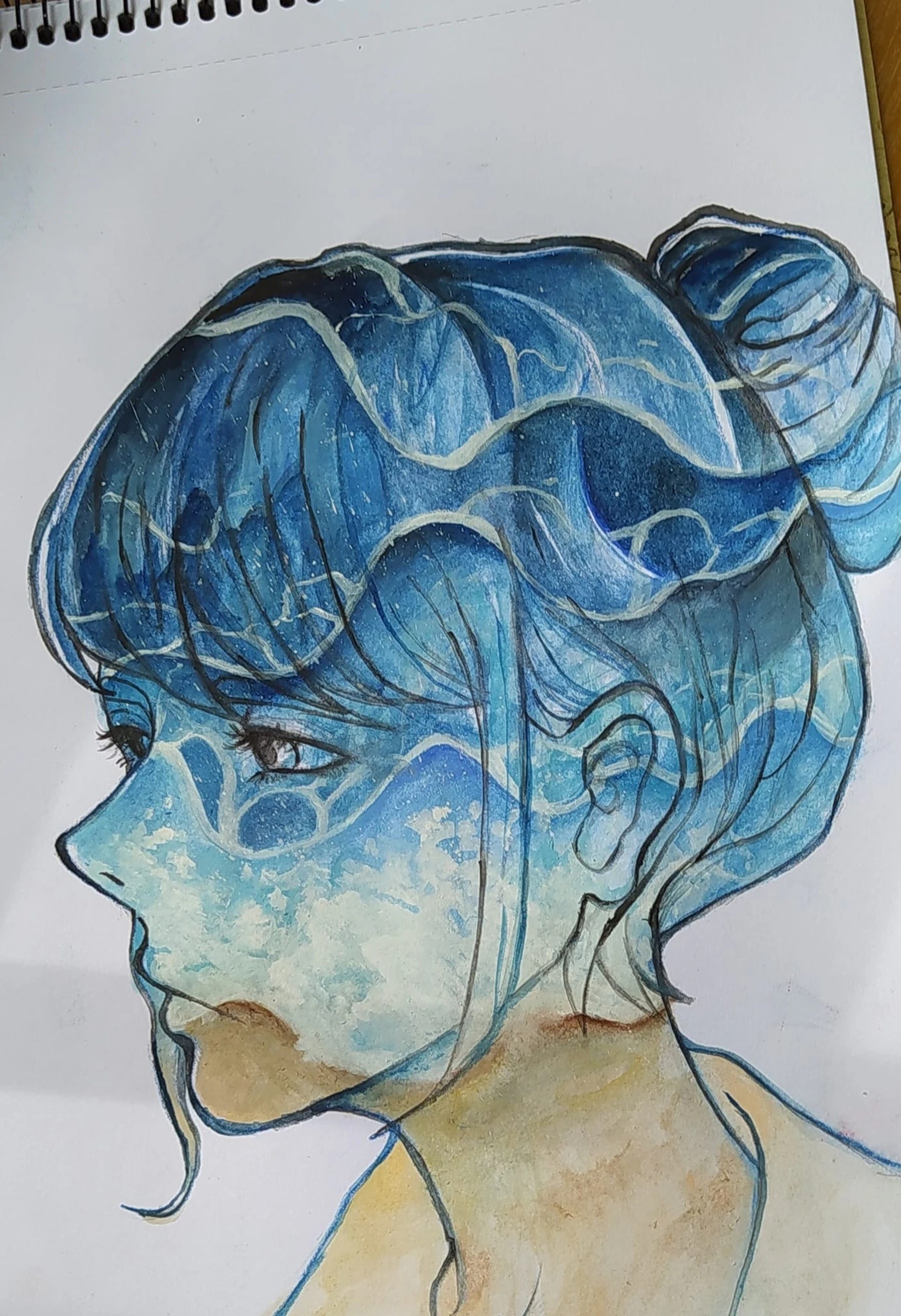 A blue-toned profile portrait with a translucent face layered inside the hair