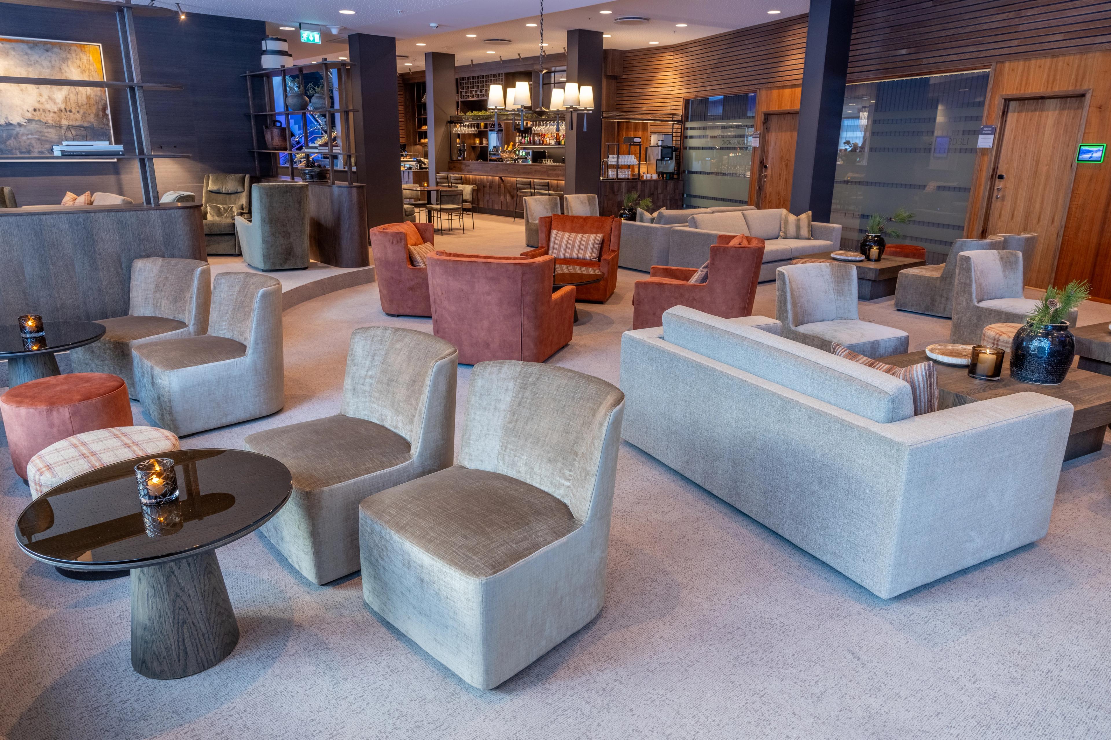 A bar with lounge chairs