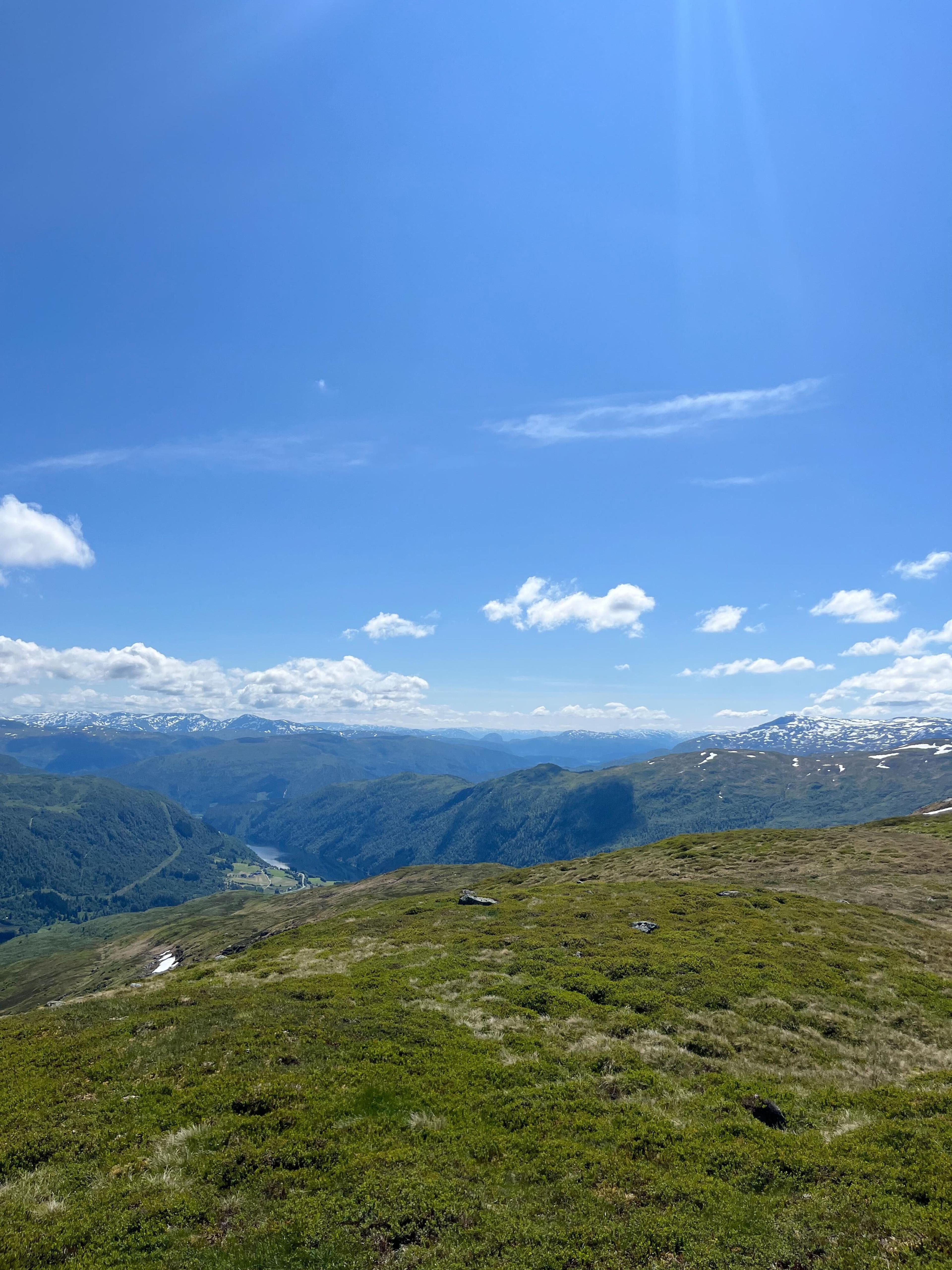 Expansive view from the mountain on a summer day.