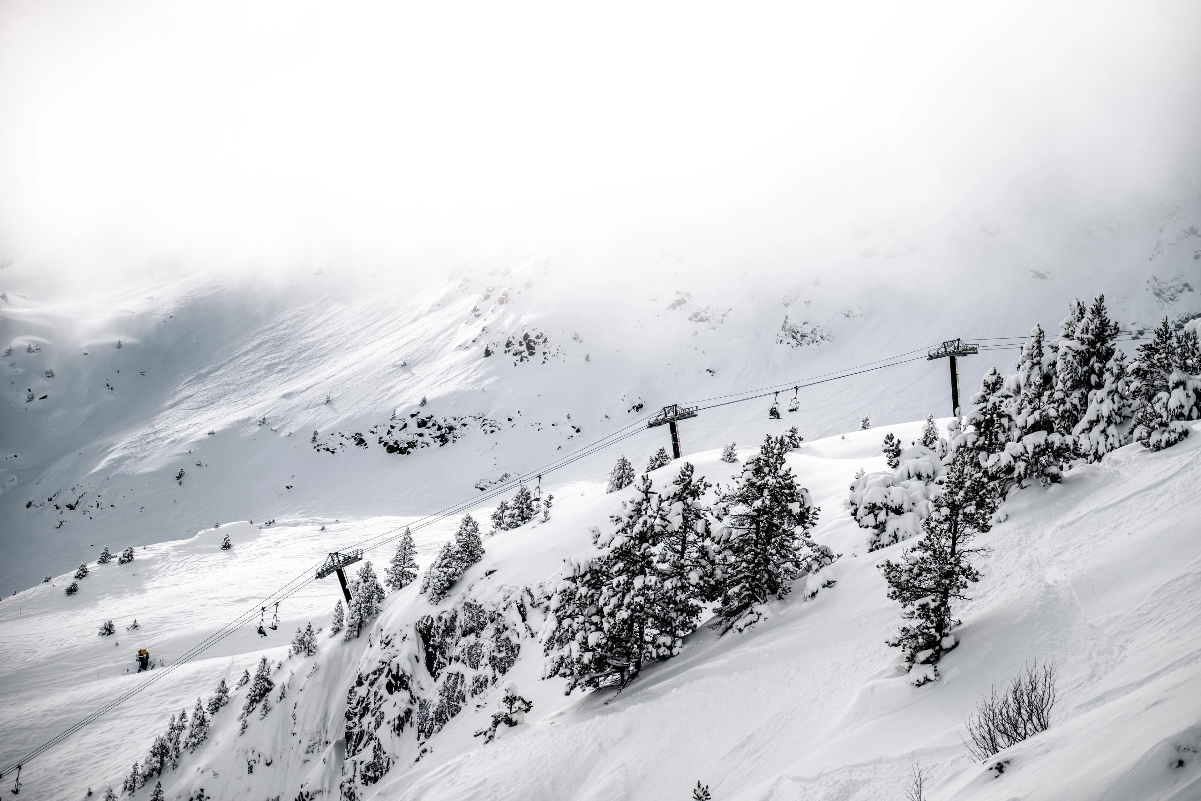 Snow-covered ski slopes and lifts in Grandvalira, Andorra
