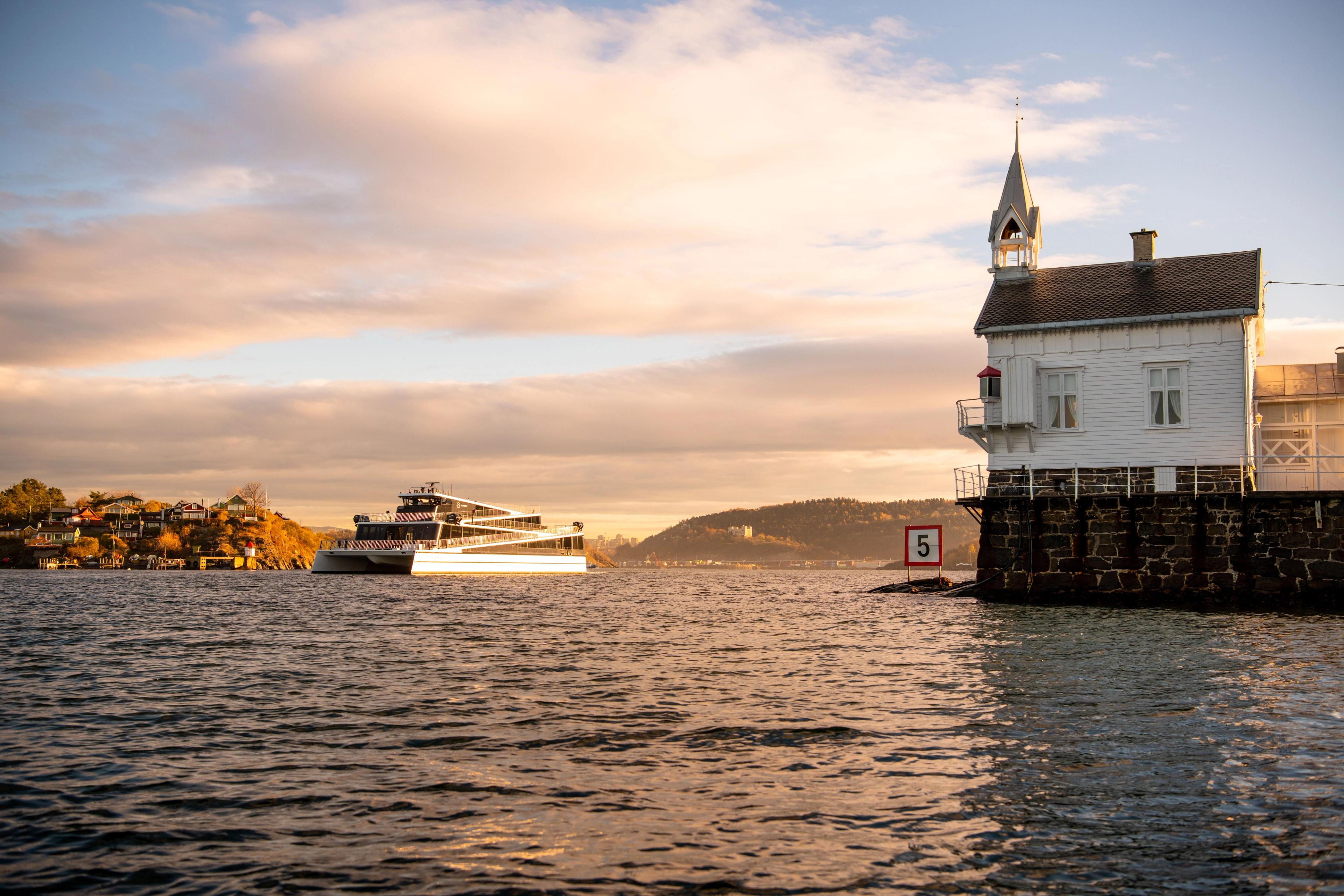Electric fjord cruise at sunset on the Oslofjord