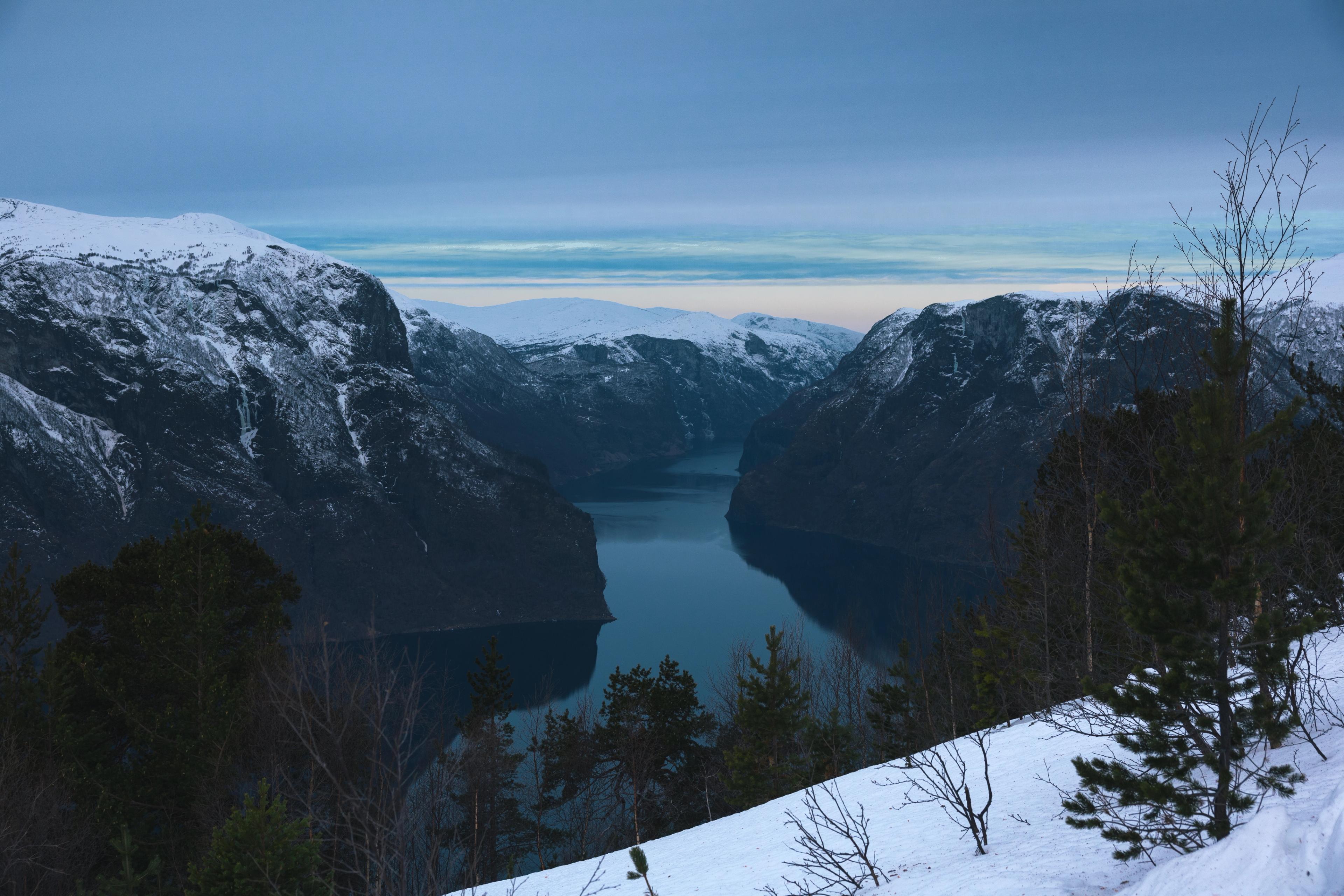 View of the Aurlandsfjord and snow-capped mountains.