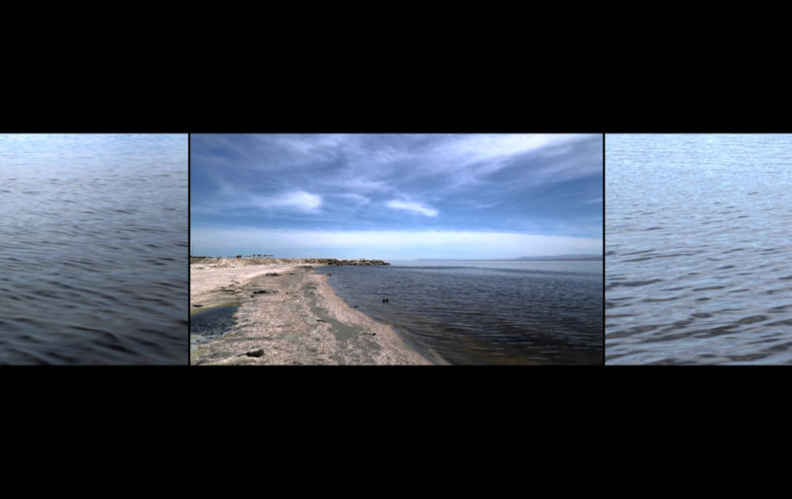 Three-channel still from the artist Sadia Sadia’s all that is solid melts into air (Salton Sea) (2017), filmed at the Salton Sea, California.