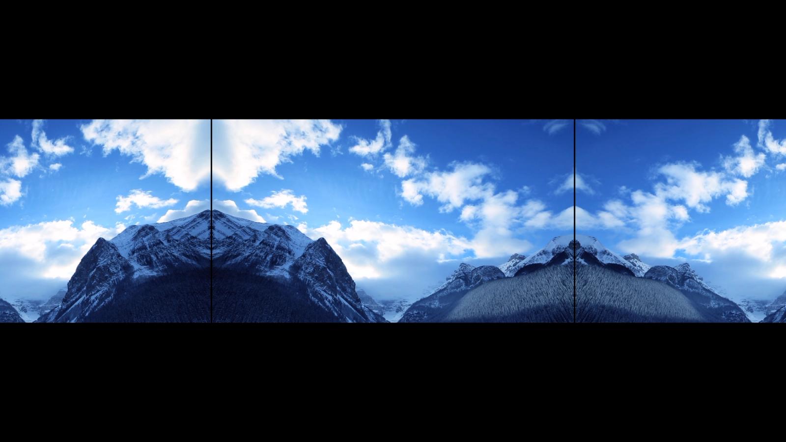 Three-channel still from Sadia Sadia’s …and falling, fulling blooming (The Sacred Ground) I–III, showing mirrored snow-covered mountain landscapes beneath a blue sky.
