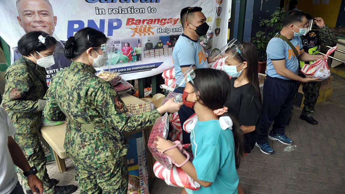 PNP's 'AYUDA SA BATA' photo by Danny Querubin