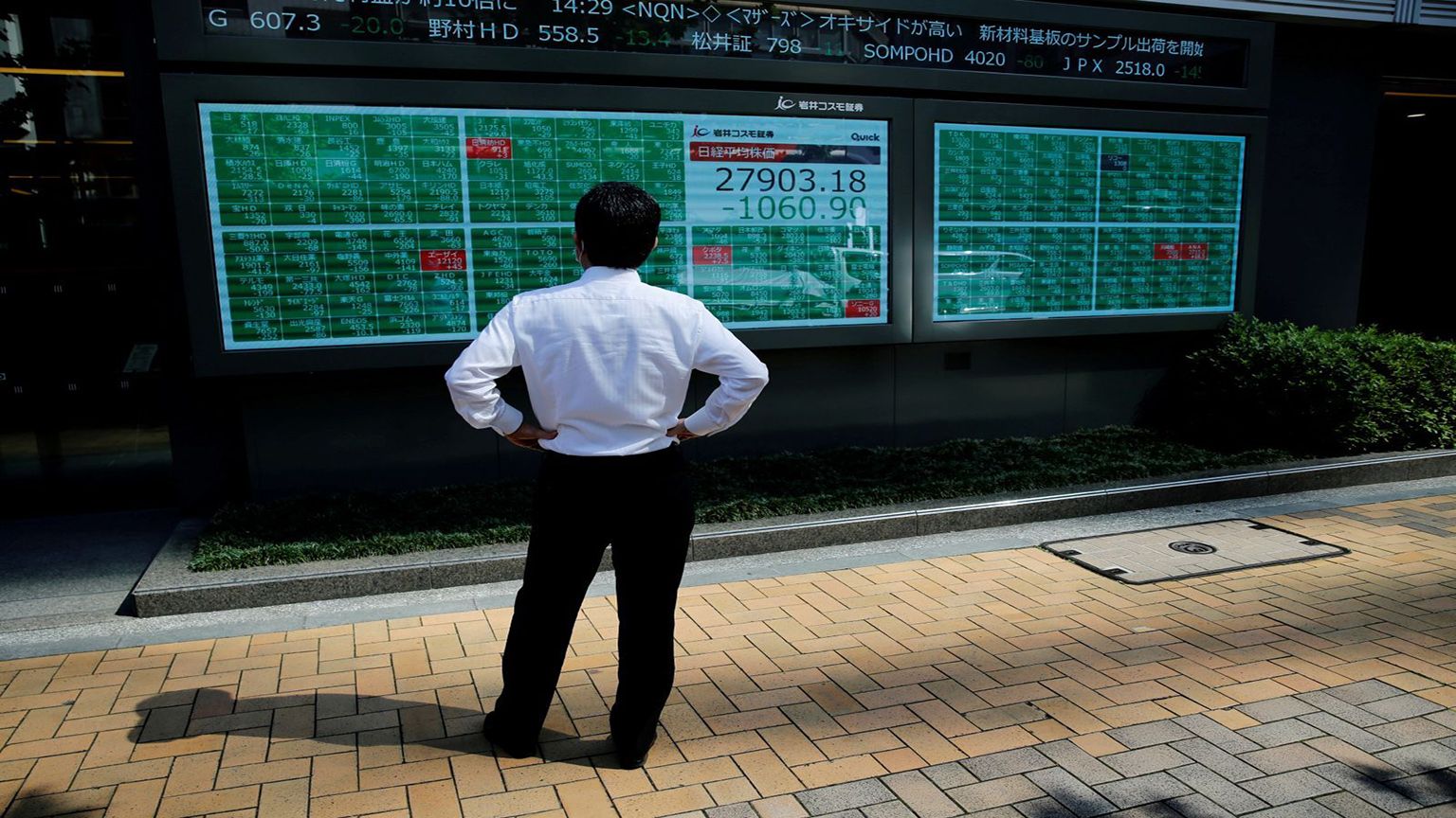 Omicron affects Asian stocks hard; investors wary of new variant photo The Business Times