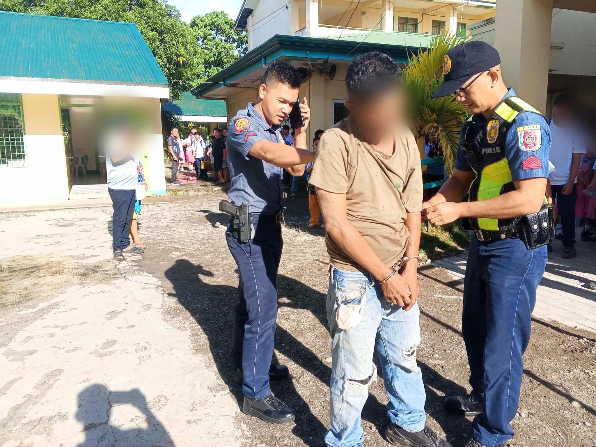 Teacher shot inside school; husband nabbed