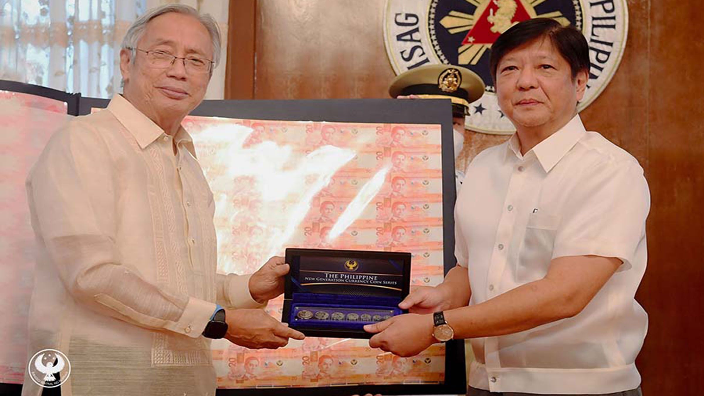 BSP hands to Marcos 1st set of new banknotes with his, Felipe's signatures