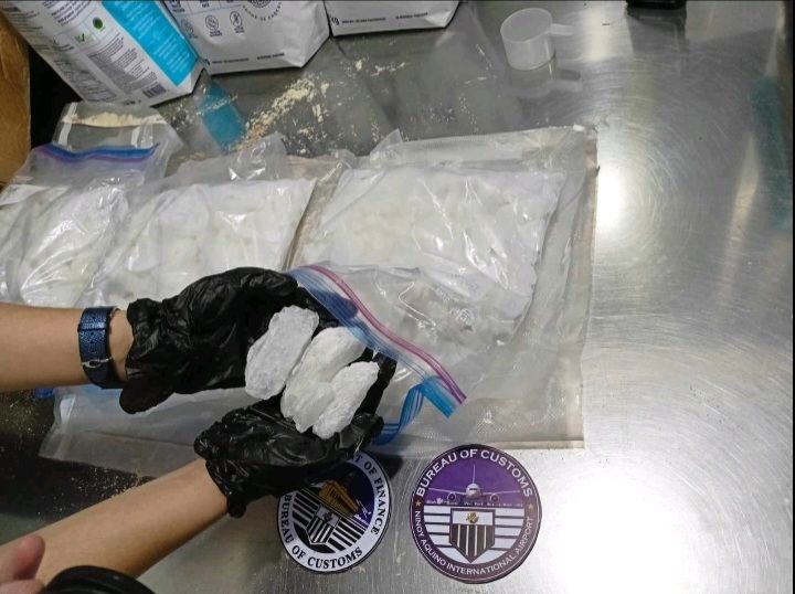 The confiscated drugs from Vancouver, Canada, where a claimant was arrested on Monday, and the handheld drug analyzer device used by operatives provides on-the-spot analysis of substances 