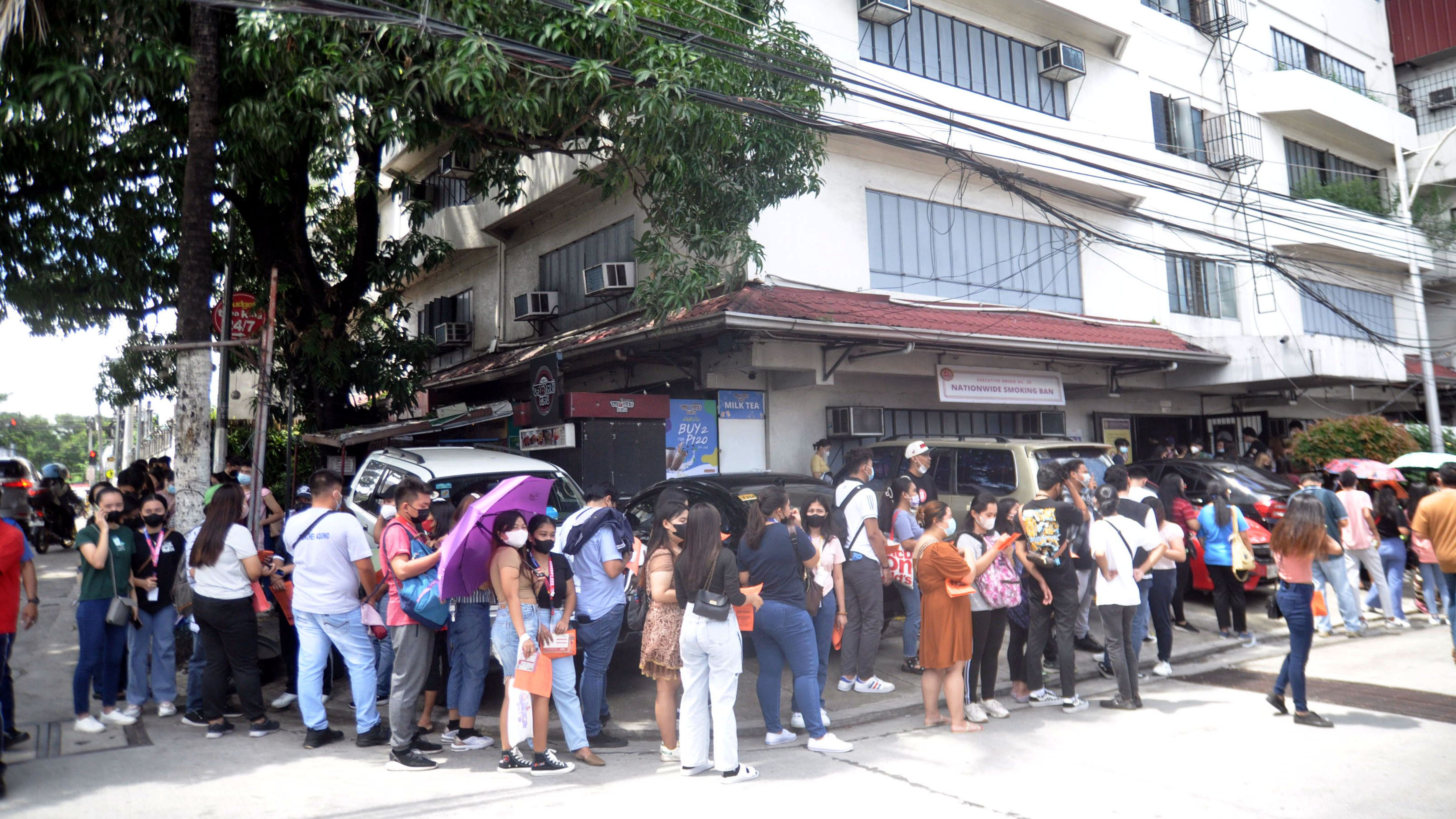 QUEUEING AT CLOSED SCHOOL Danny Querubin