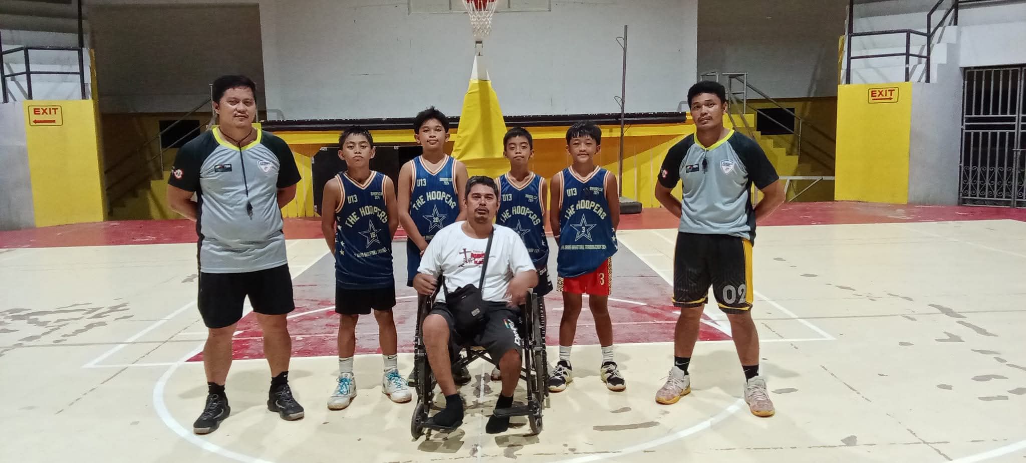 Las Navas PWD basketball coach leaps on faith--main title