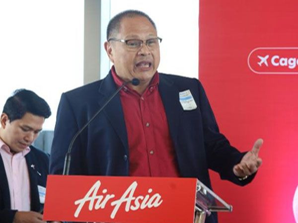 AirAsia Philippines CEO Ricky Isla announces the festive return of the airline's 56 weekly flights to various destinations (BENJAMIN LIM)