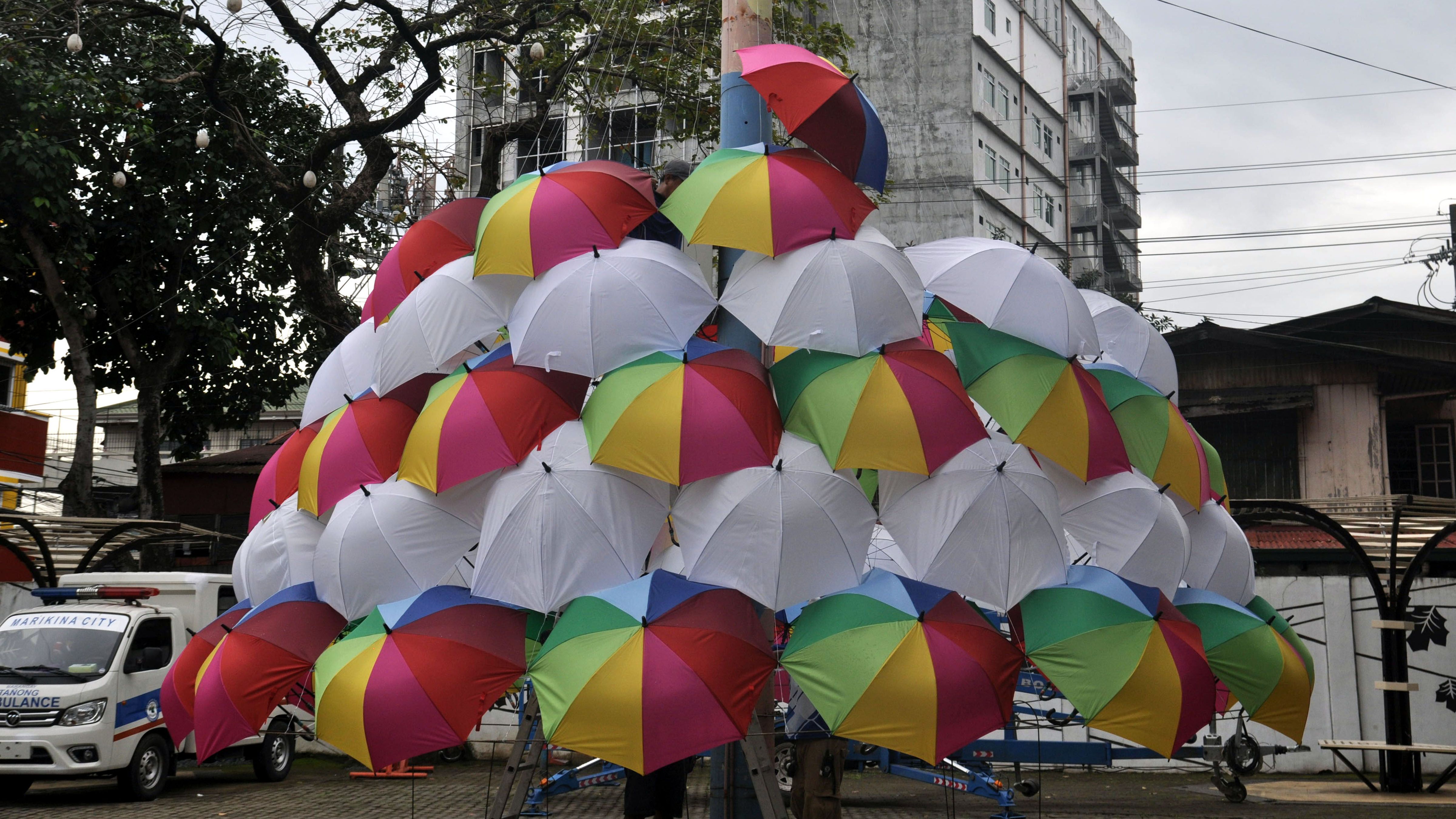 A CHRISTMAS TREE FROM UMBRELLAS Danny Querubin