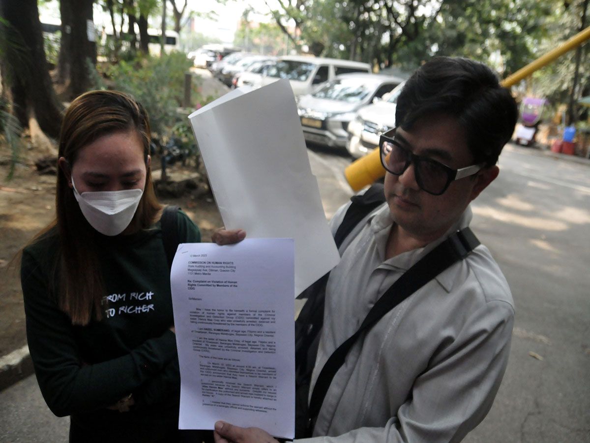 CIDG charged before CHR--  Hazel Sumerano (left)--  accompanied by lawyer Toby Diokno, files a complaint before the Commission on Human Rights today regarding violations of human rights being committed by members of Criminal Investigation and Detection Group in connection with the arrest of her sister Hannah Mae Oray, personal secretary of Rep. Arnolfo Teves (Negros Oriental) , who is abroad but is being suspected of masterminding the assassination of Governor Roel Degamo, to pin down her boss.. DANNY QUERUBIN 