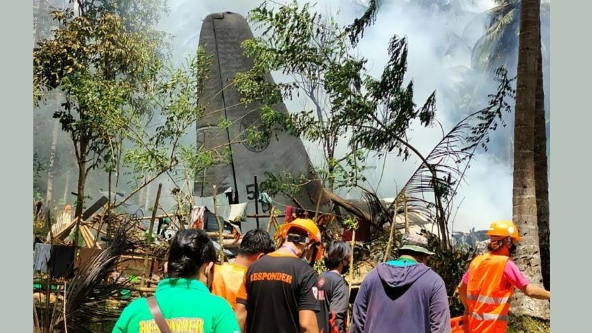 Authorities face difficult task of identifying the charred bodies of C-130 crash photo from Yahoo News