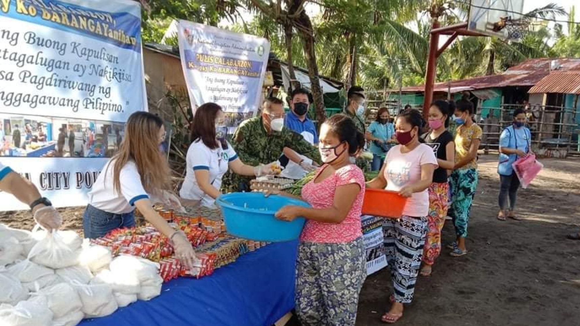 Pulisya, nagsagawa ng community pantry para sa mga Sama Badjao ng Lucena, National Irrigation Administration - Region IV-A, Facebook Pulisya, nagsagawa ng community pantry para sa mga Sama Badjao ng Lucena