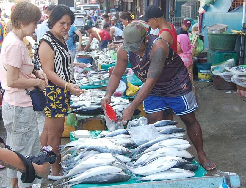 DESPITE EASING INFLATION, FILIPINOS STILL SUFFER