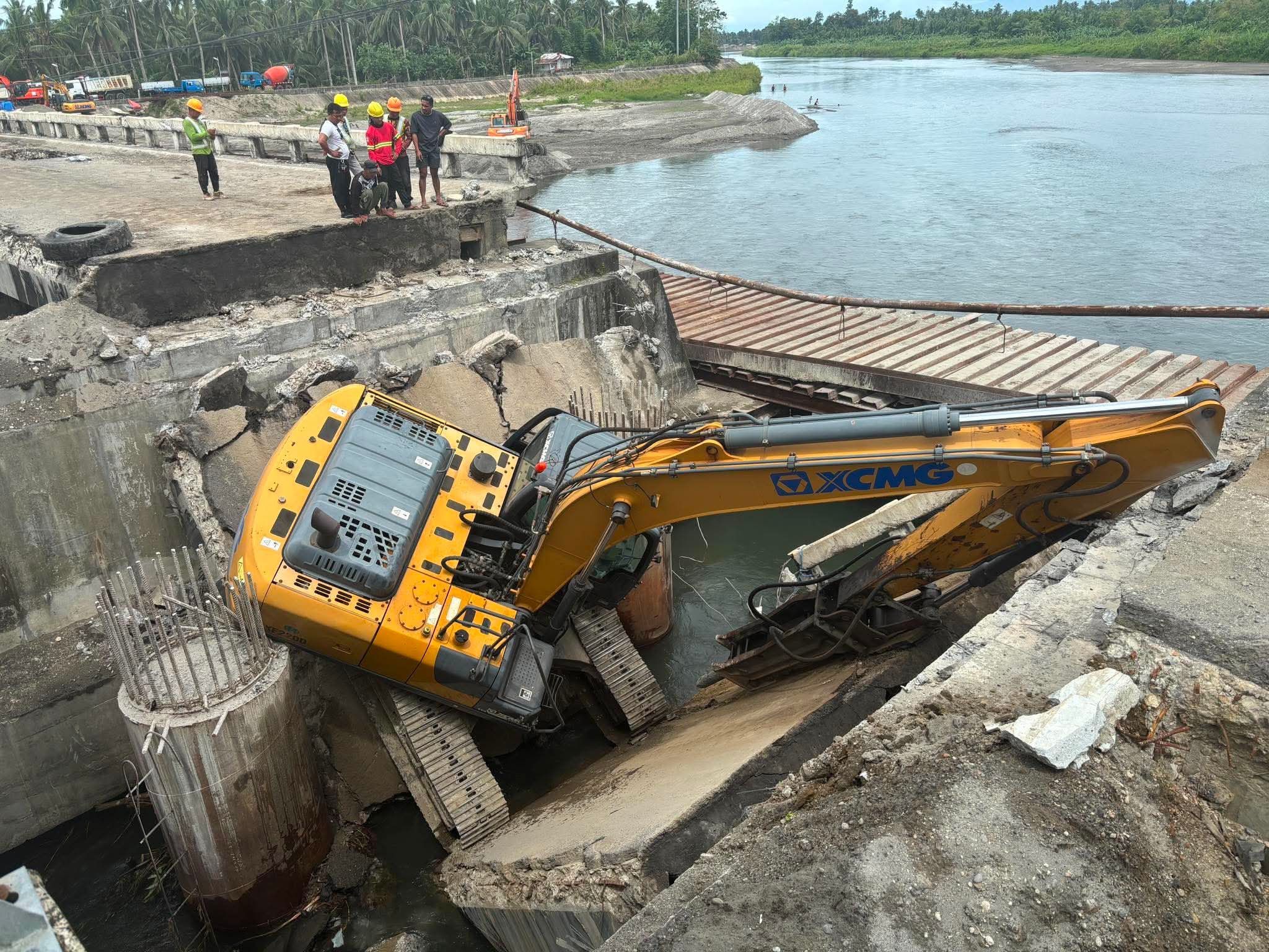 Heavy Equipment Falls From Collapsing Bridge