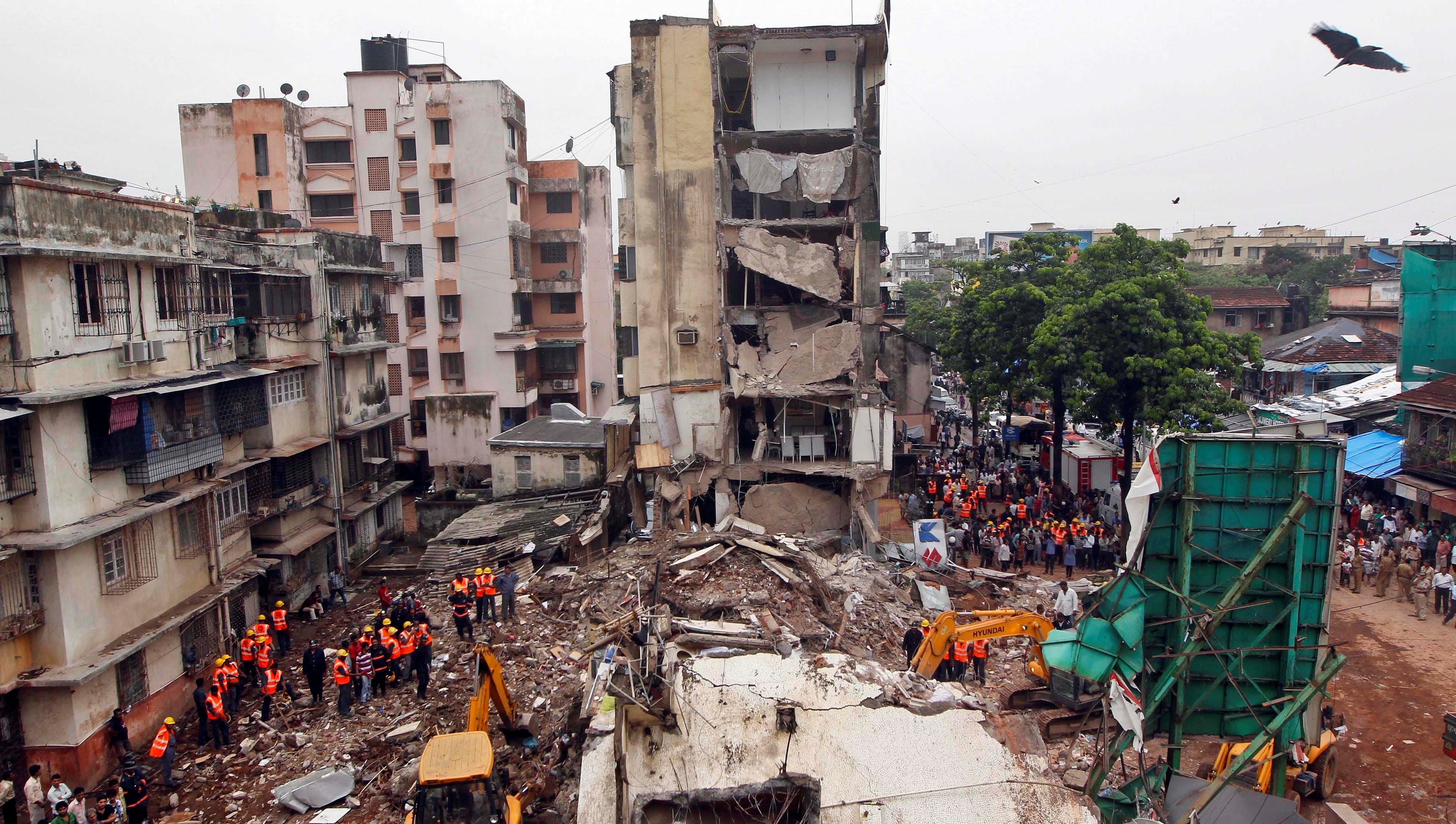 11 killed as old building collapses from heavy rains in India