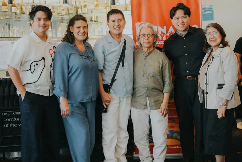 Brillante Ma. Mendoza feels ordinary, sits at the reception table of his film festival baby
