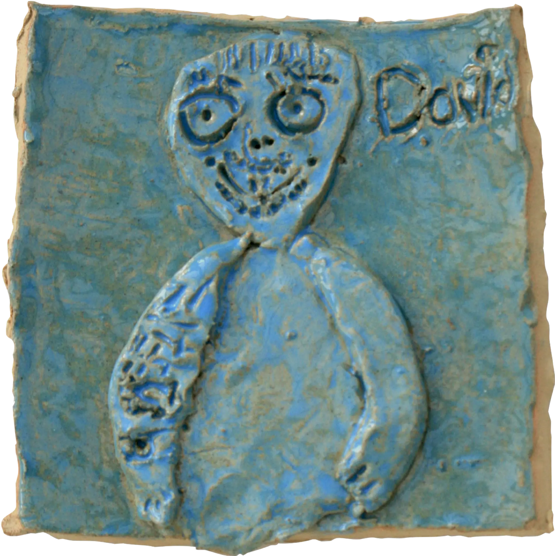 A blue glazed ceramic tile of David, Jessica’s sister’s boyfriend. He is smiling and has a detailed tattoo on his right arm. 