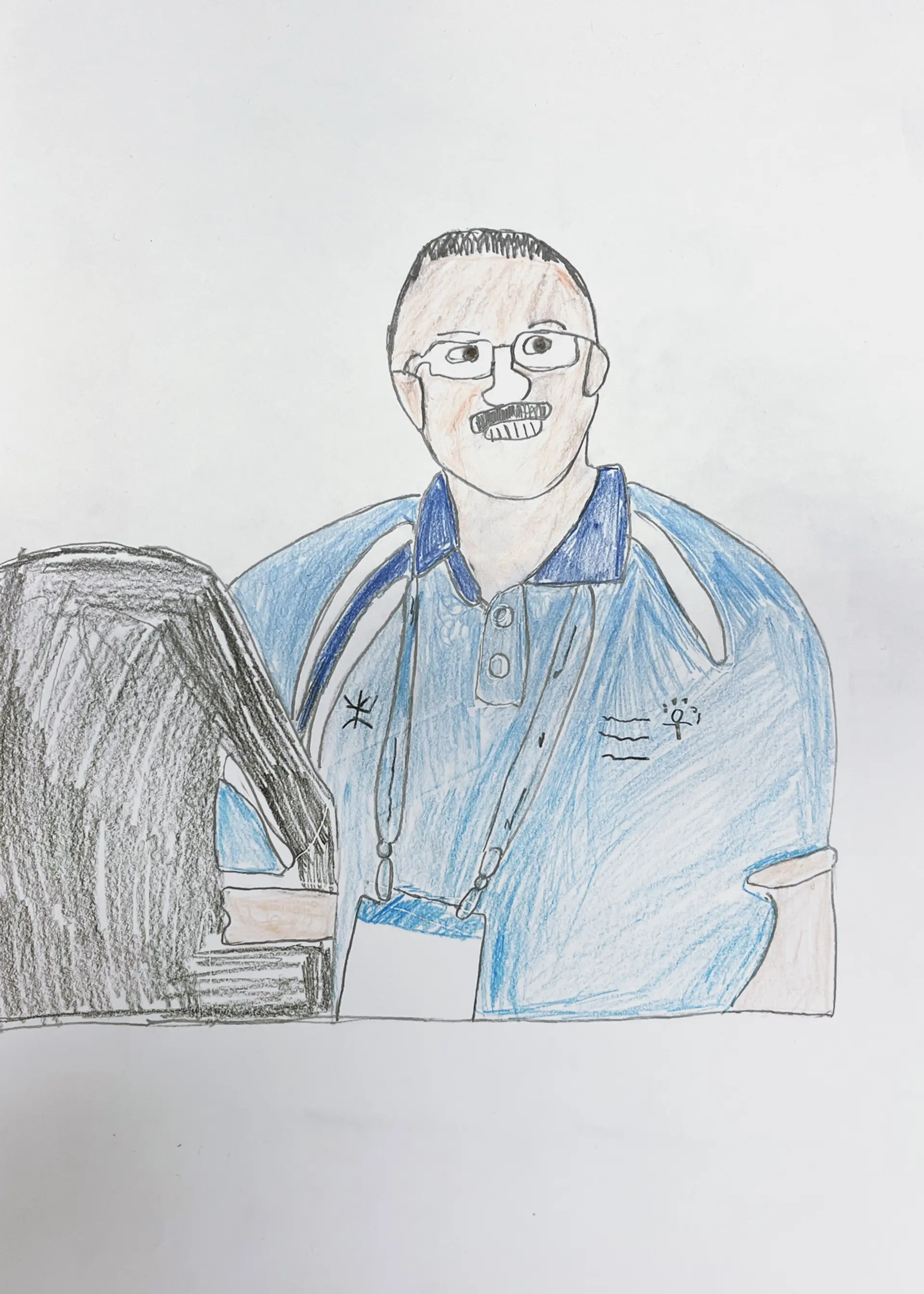 A coloured pencil drawing of Maria’s dad, he has a blue shirt on, he has a moustache and is wearing glasses. He is smiling at the viewer. 