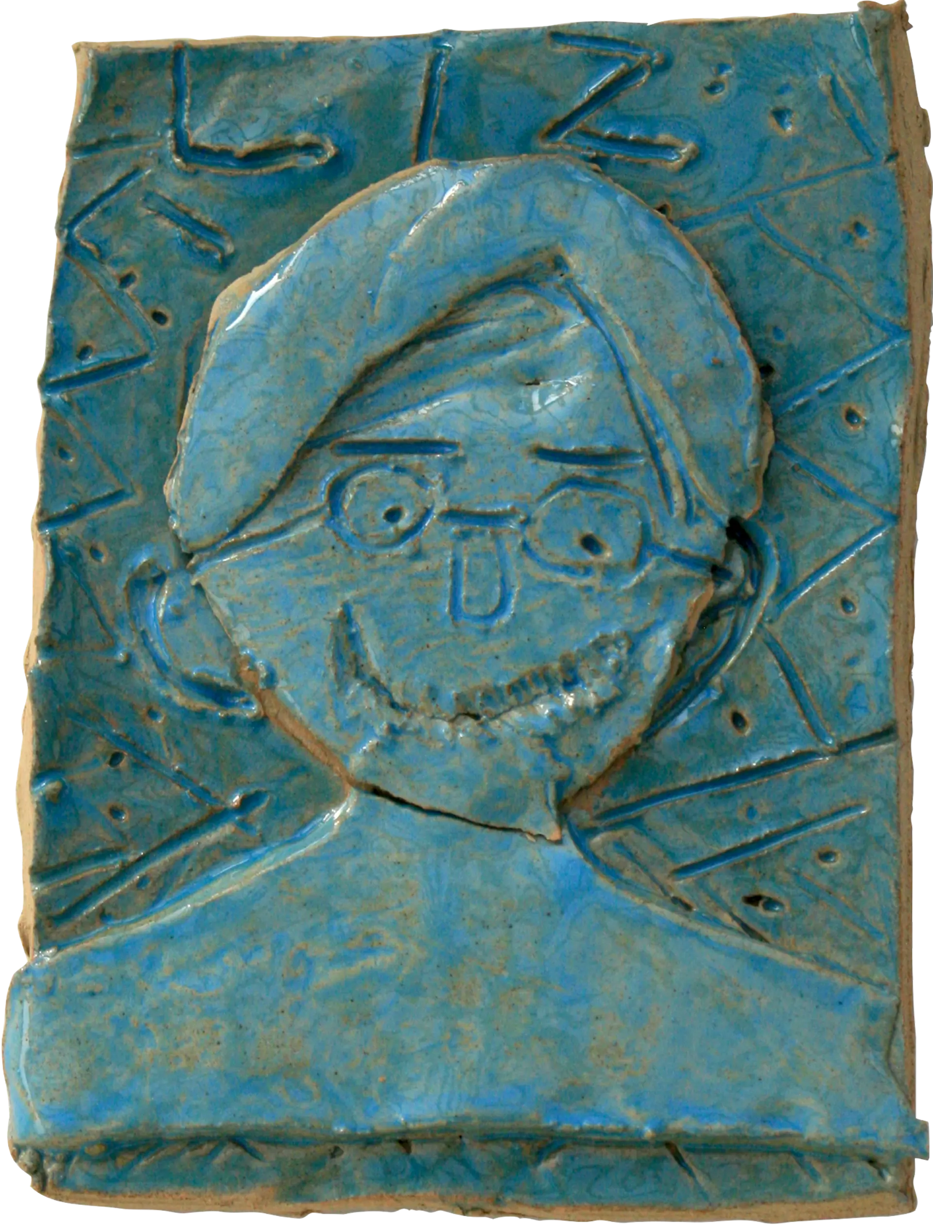 A blue glazed ceramic tile of Liz, Maria’s mum. She is wearing glasses and is smiling. The background is decorated with jagged jazzy lines and dots. 