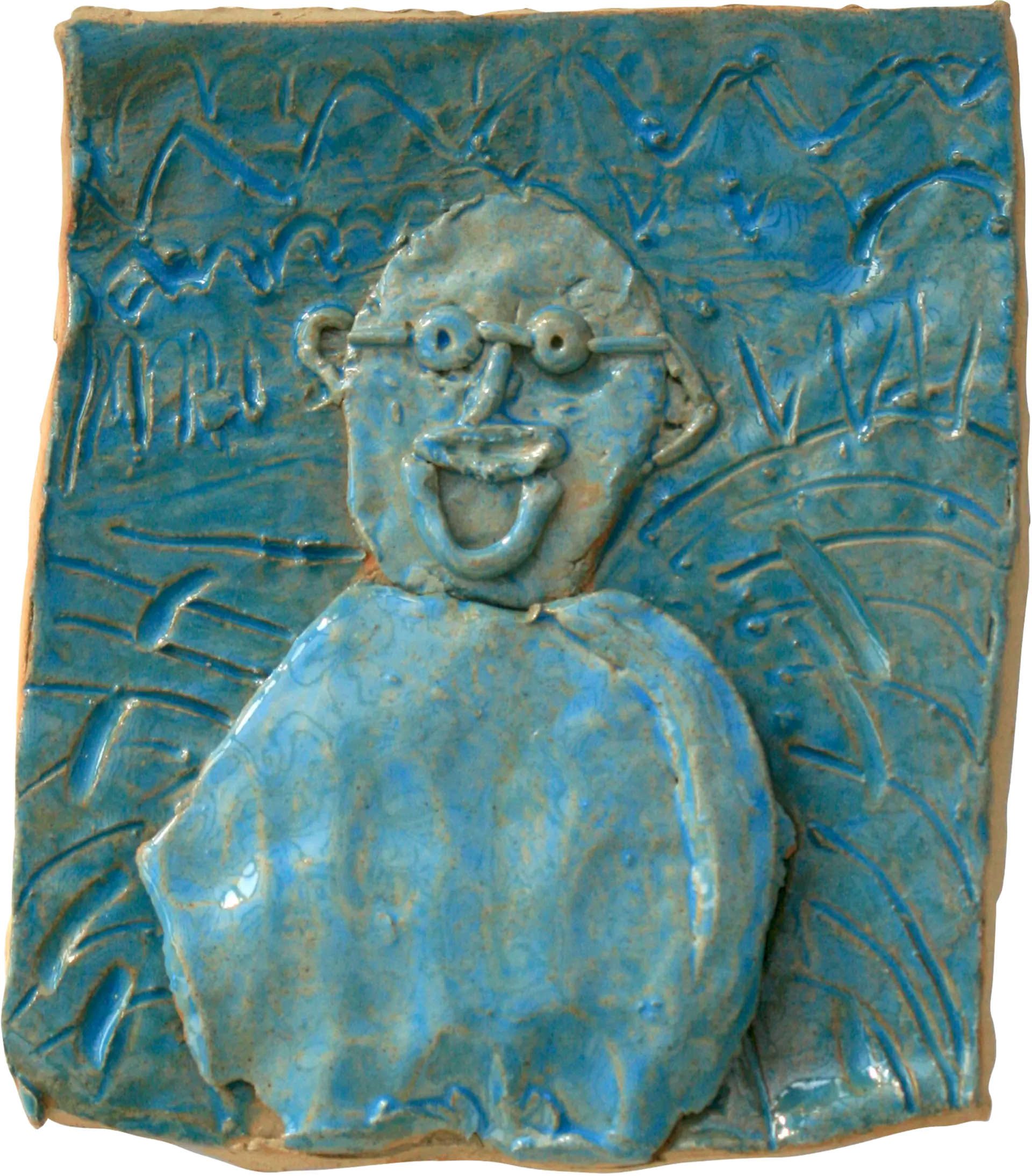 A blue glazed ceramic tile of Maria’s dad. He is wearing glasses and has a moustache. He is smiling. The background is decorated with wavy lines.