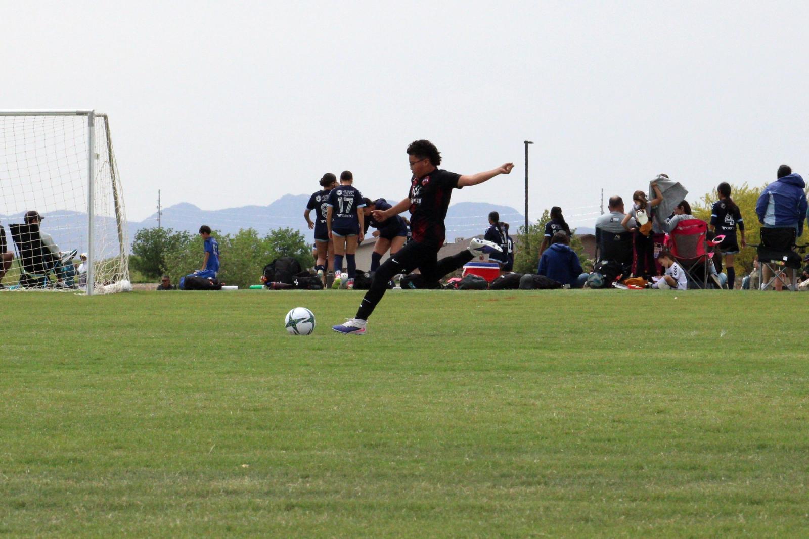 A shot on goal during a Copa de Campeones game
