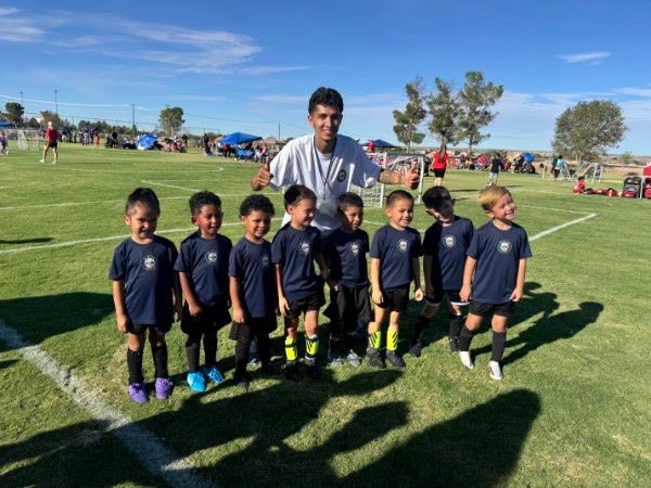 The U5 team with their coach after a Saturday game