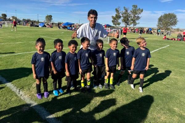 The U5 team with their coach after a Saturday game