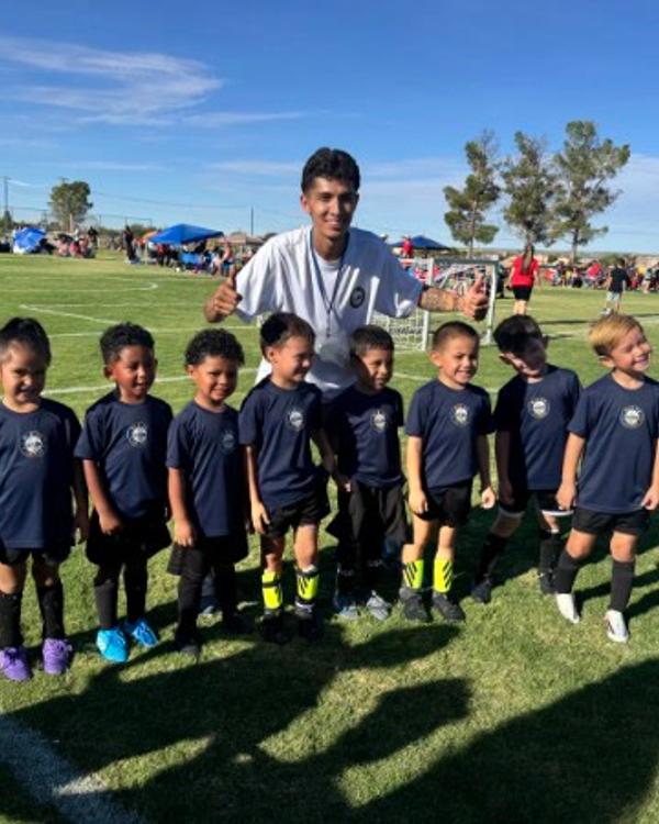 The U5 team with their coach after a Saturday game