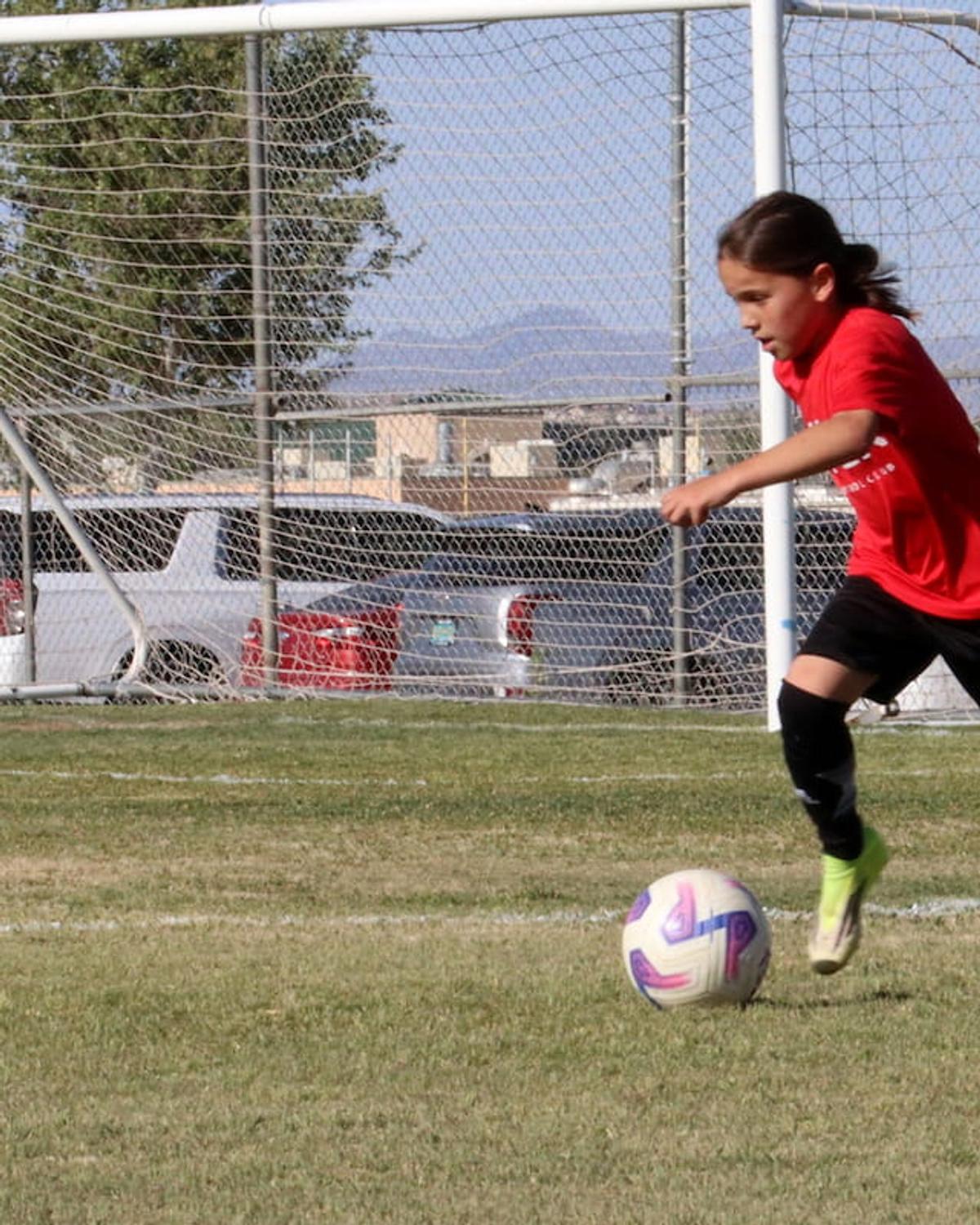 One-on-one training session on the field