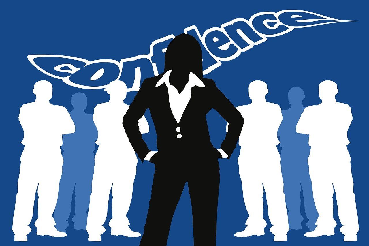 A person standing confidently, representing self-empowerment and the journey to boosting confidence through NLP practices