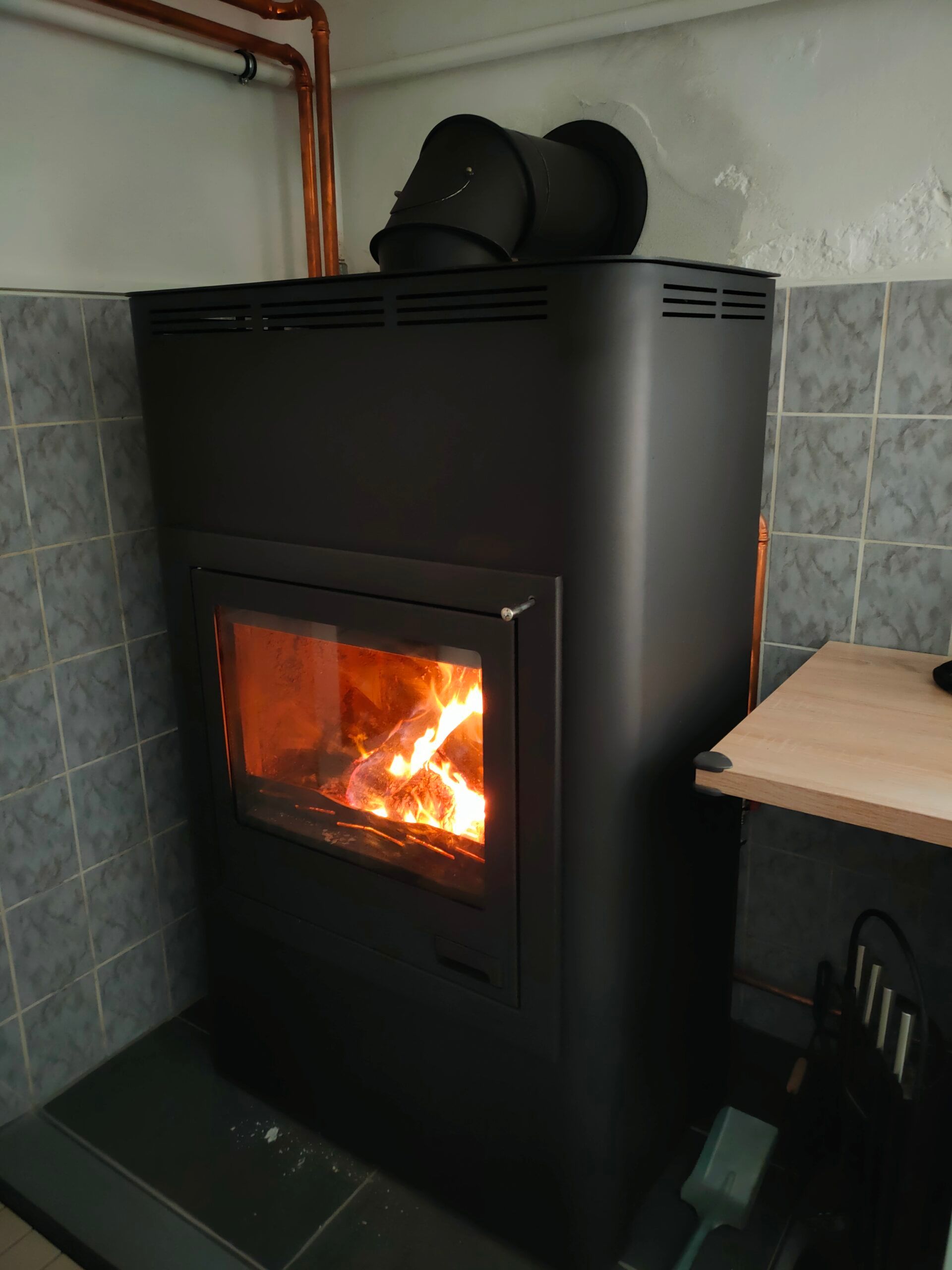 Recenze kamen s výměníkem AQUAFLAM 25 a automatickou regulací hoření