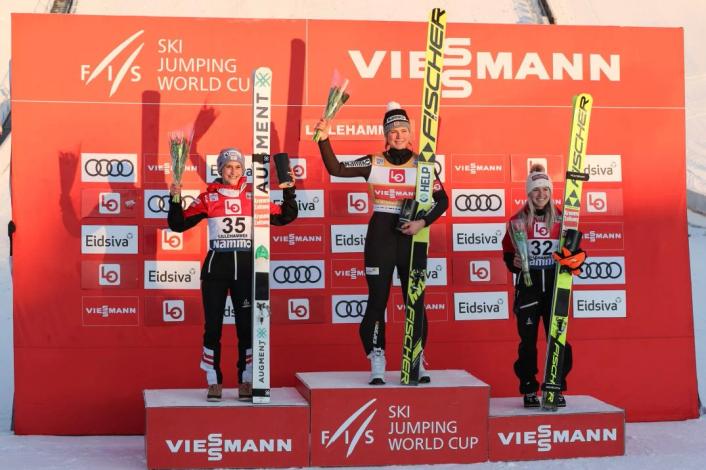 Augment ski jumper on world cup podium