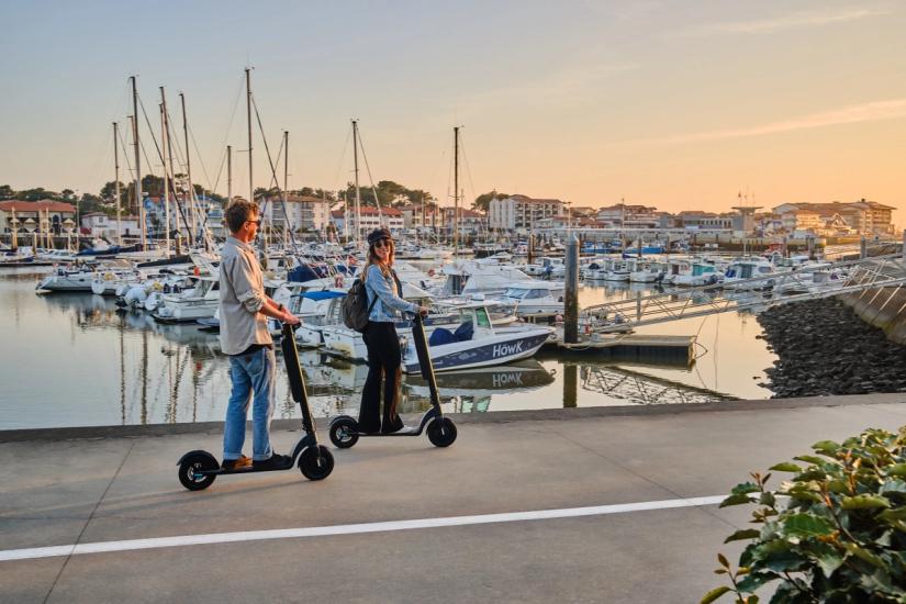 Enjoy the ease of a personal Augment ES210 e-scooter, always ready for your needs