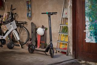 Augment e-scooter stored in a garage