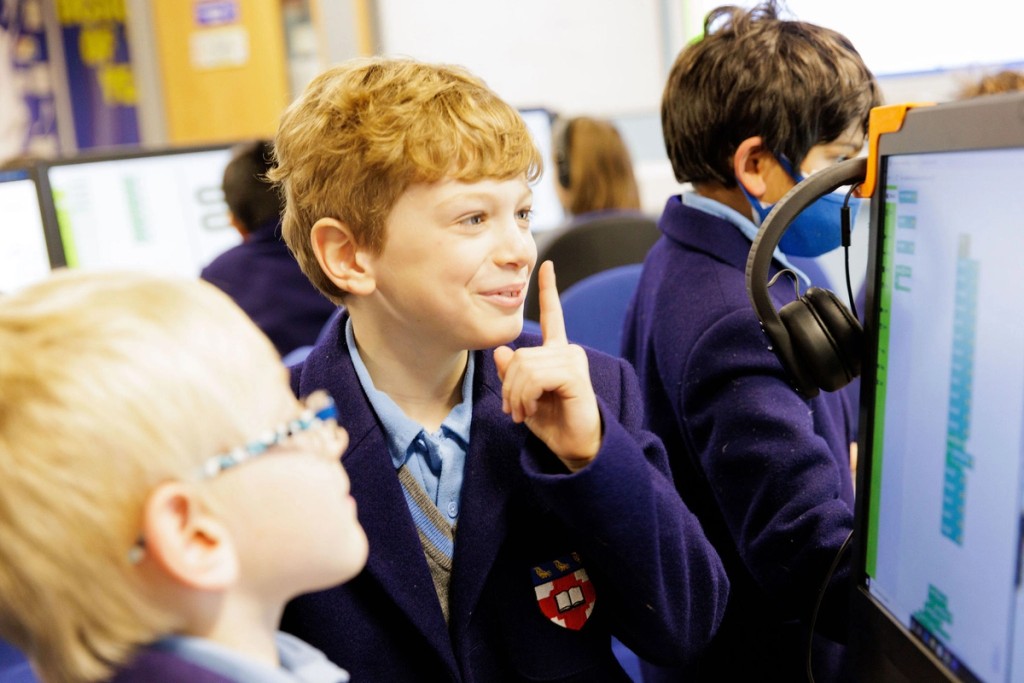 pupils in a room with computers 