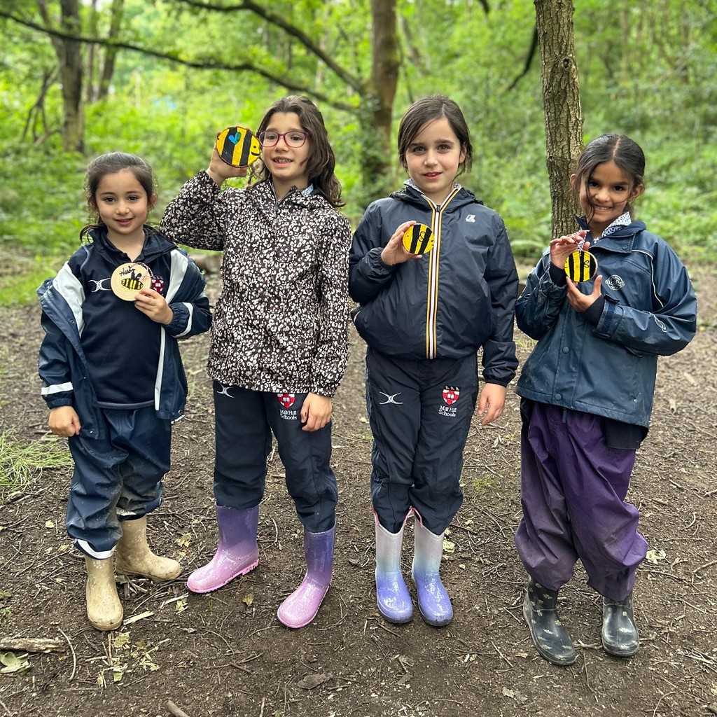 Young pupils wearing wellies 